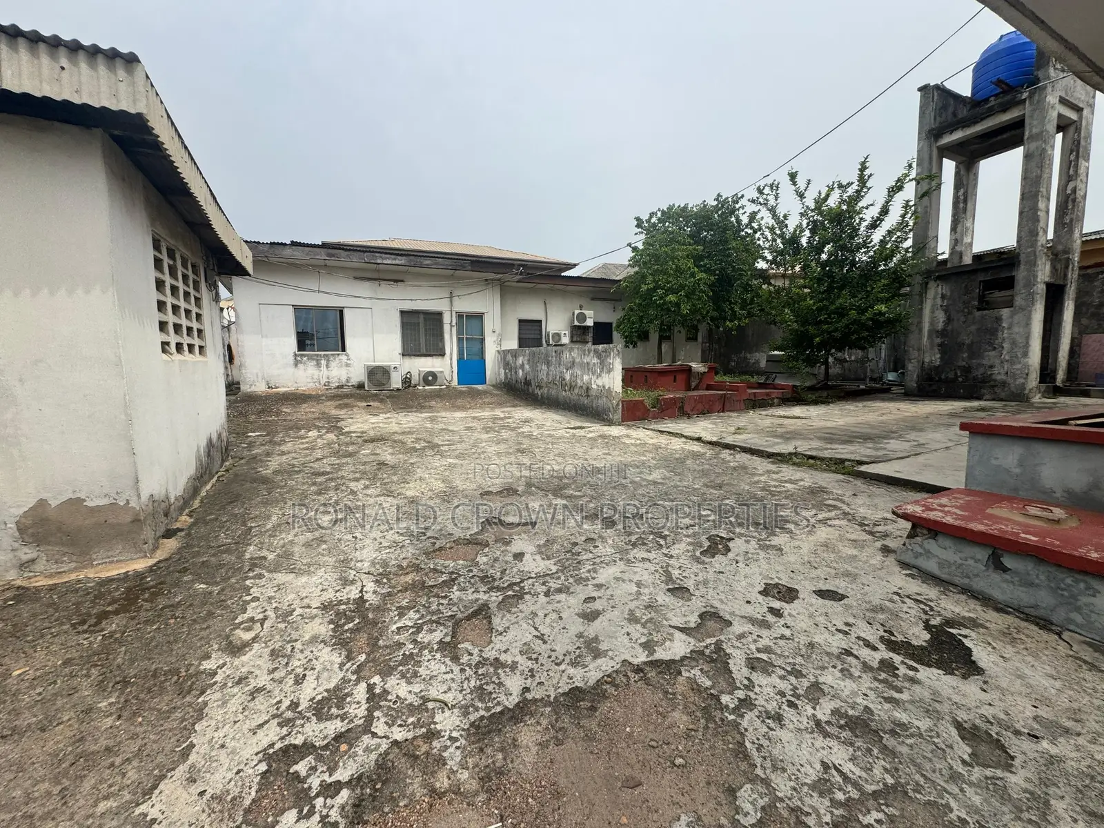 Land Measuring 1000sqm With Demolishable Building at Ikeja