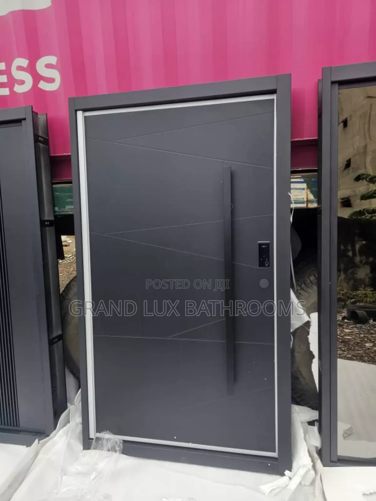 Modern Matte Black Pivot Security Door With Smart Lock System