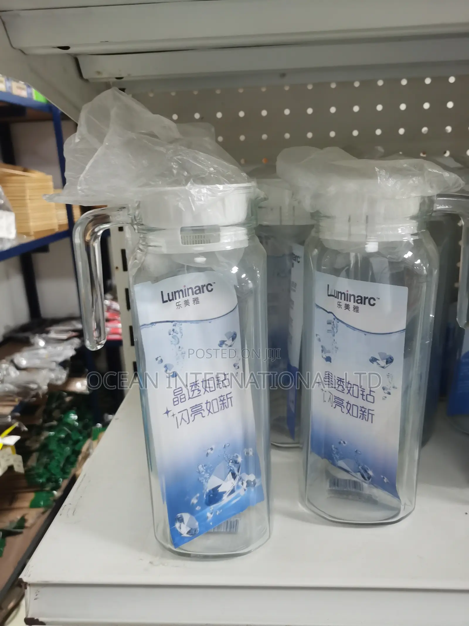 Luminarc Water Pitchers (Jugs) With Handles and White Plastic Lids.