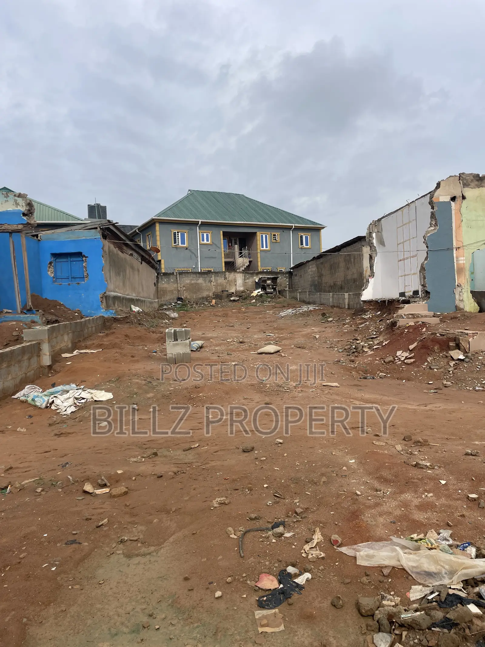 A More Than a Half Plot of Land on a Very Busy Tarred Road