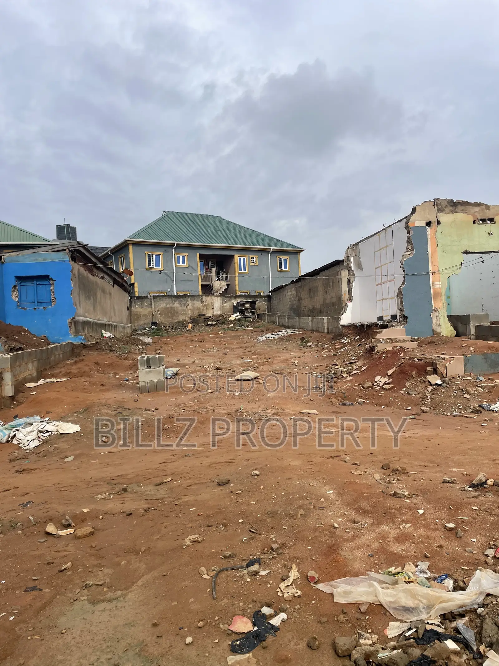 A More Than a Half Plot of Land on a Very Busy Tarred Road