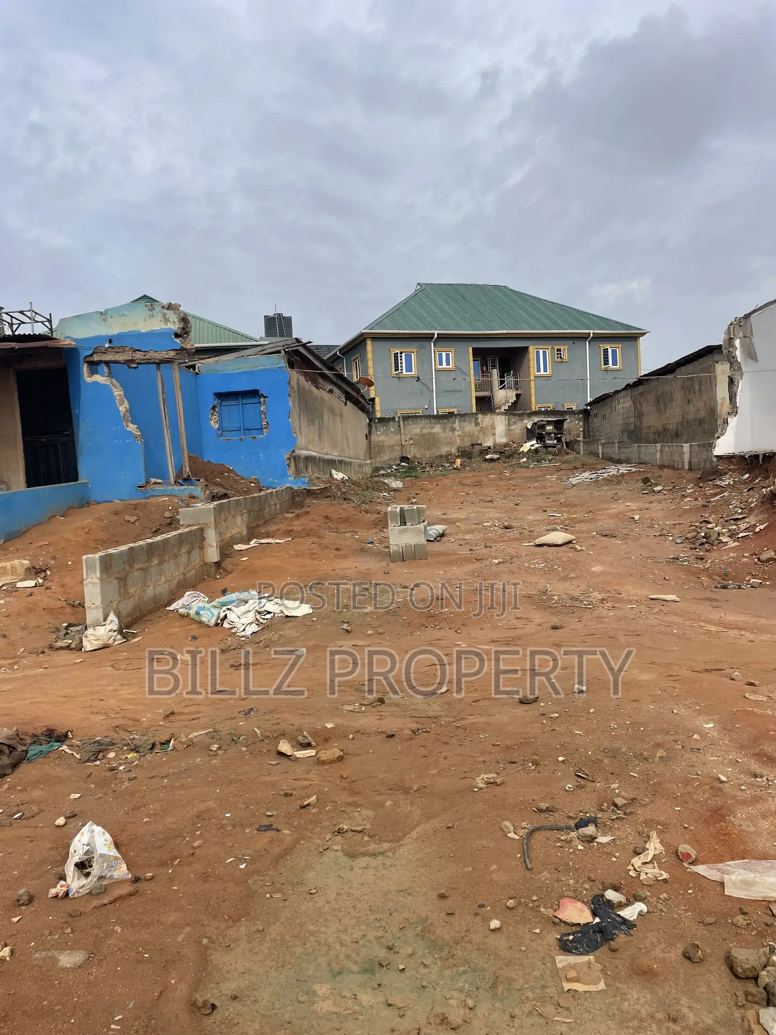 A More Than a Half Plot of Land on a Very Busy Tarred Road