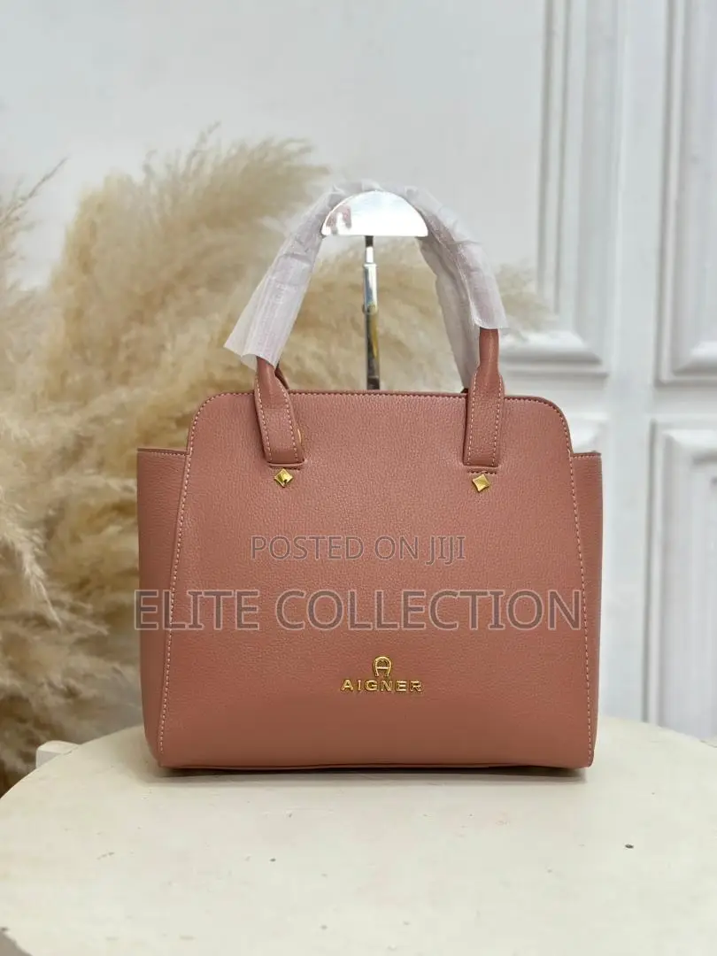 Aigner Bag Material:- Leather Gender:-Female Bag Size:- Medium