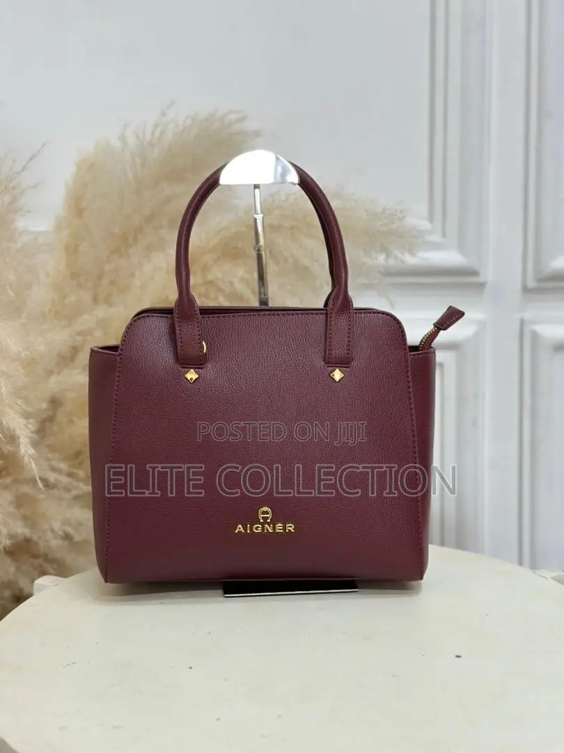 Aigner Bag Material:- Leather Gender:-Female Bag Size:- Medium