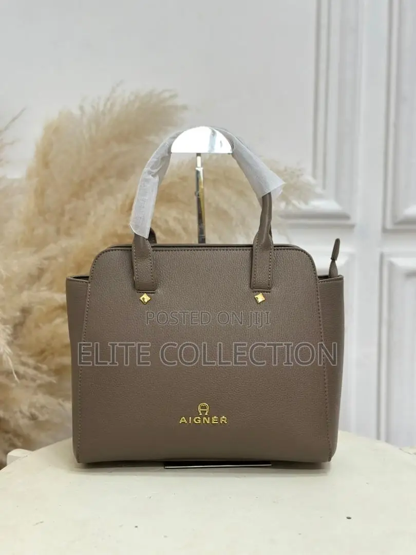 Aigner Bag Material:- Leather Gender:-Female Bag Size:- Medium