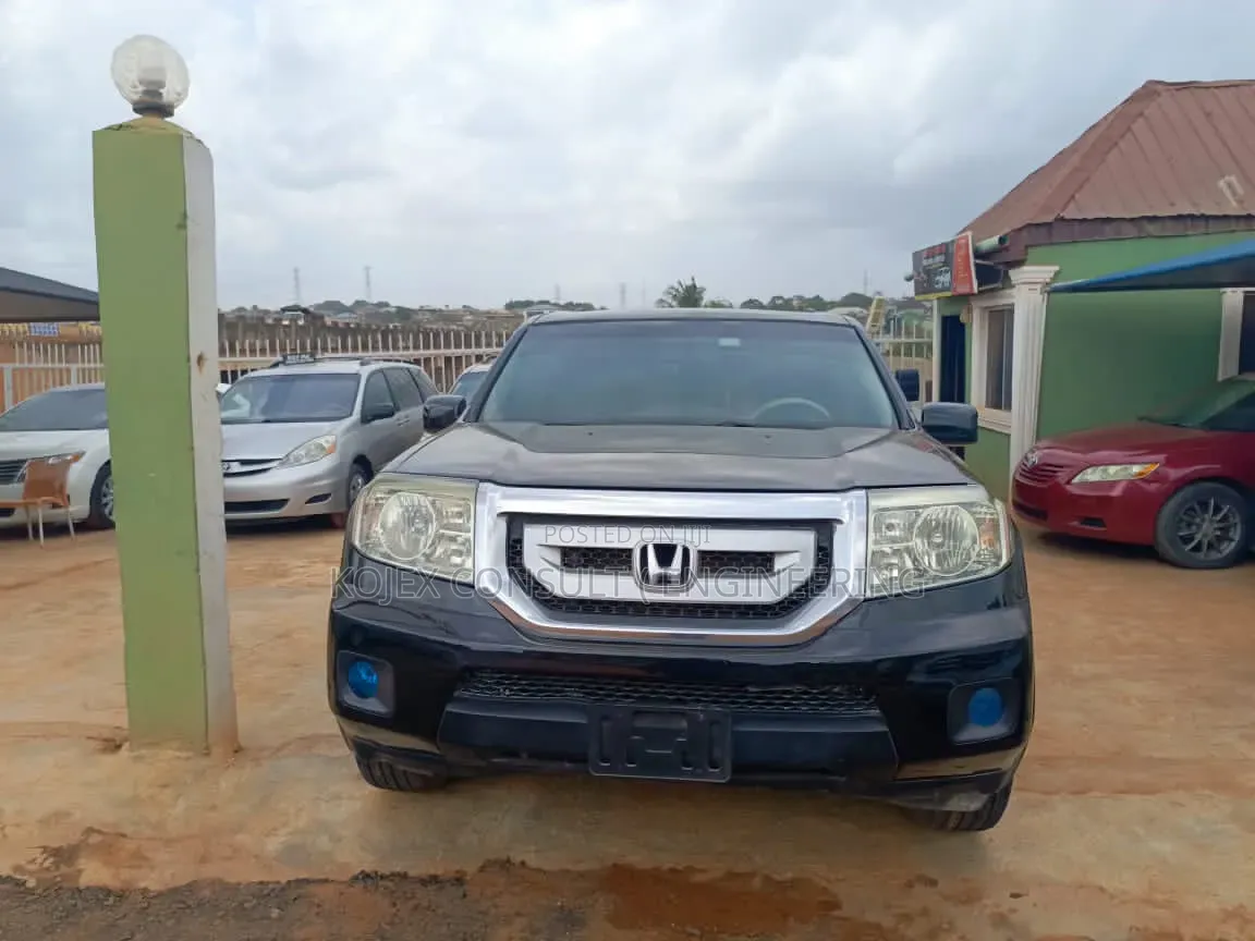 Honda Pilot Touring w/RES/Navi 4WD (3.5L 6cyl 5A) 2010 Black