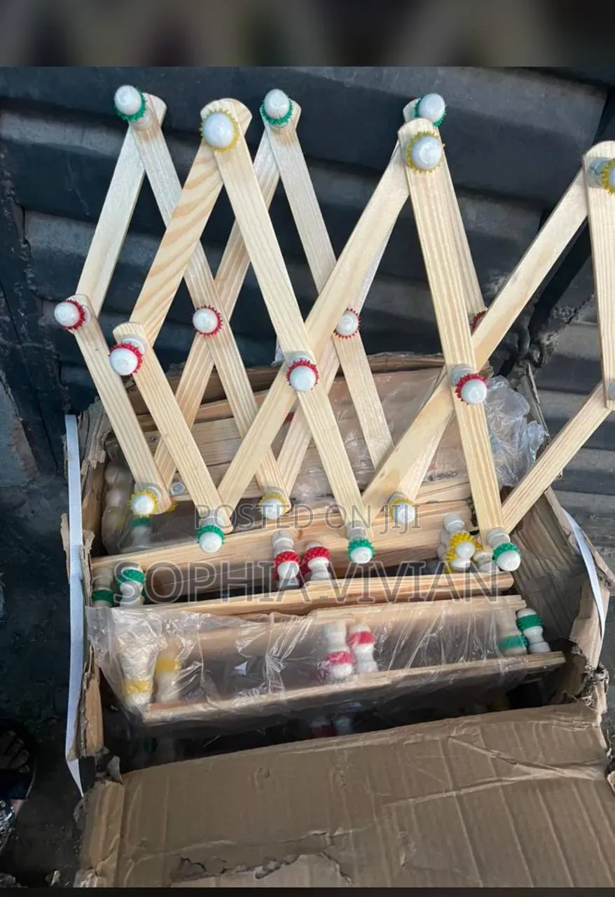 Expandable Accordion-Style Wooden Peg Racks.