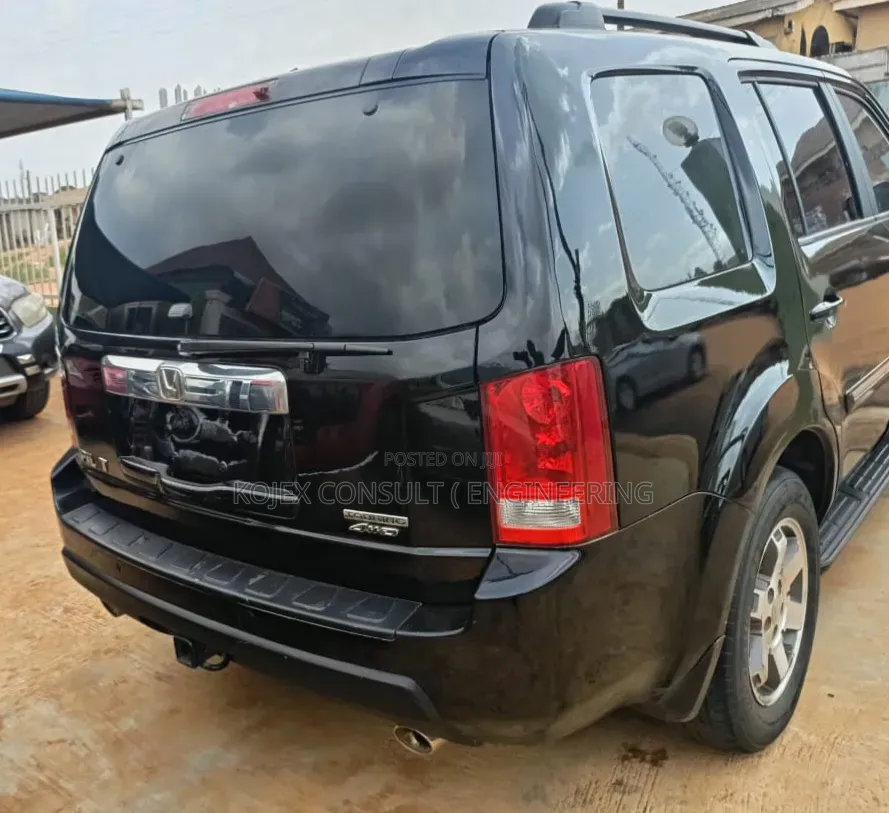 Honda Pilot Touring w/RES/Navi 4WD (3.5L 6cyl 5A) 2010 Black