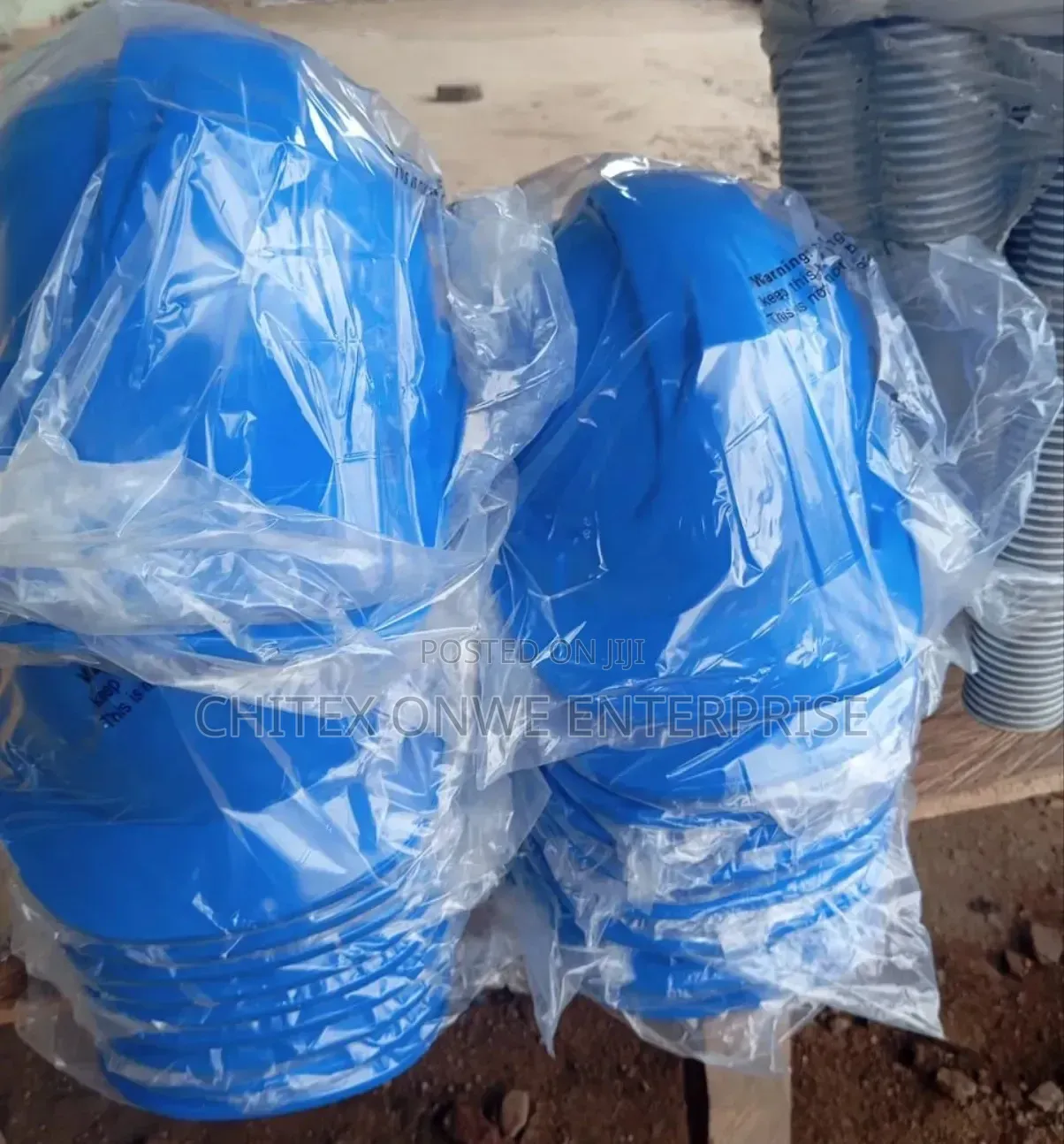 Yellow Hard Hats (Or Construction Safety Helmets).