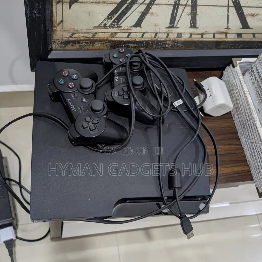 Grade a Uk Used Ps3 Slim With 2 Pads and 10 Games Installed