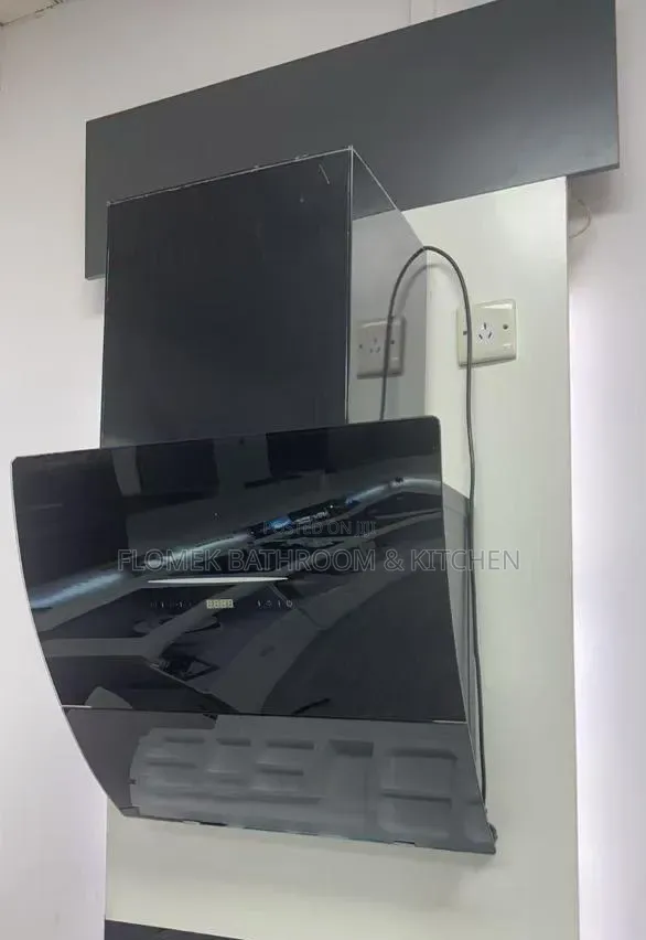 Sleek Black Glass Kitchen Extractor Hood – Modern Powerful.