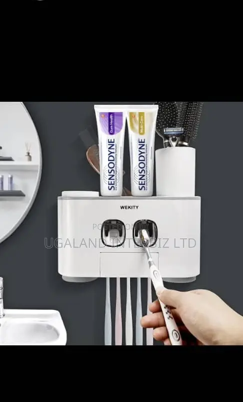 Wall Mounted Toothpaste Dispenser And Toothbrush Holder