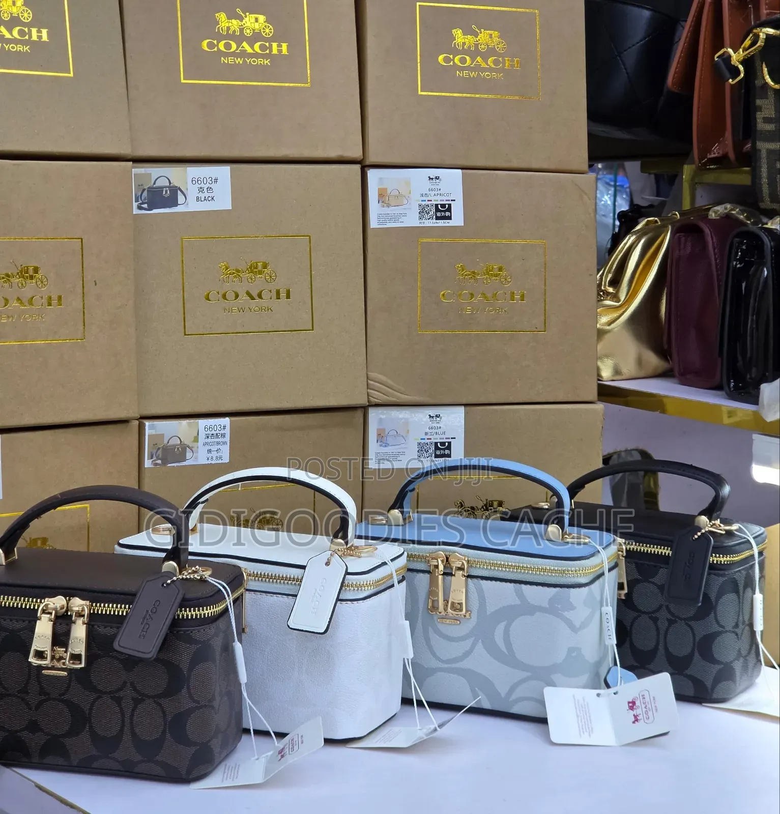 Box-Shaped Coach Top-Handle Vanity Bags