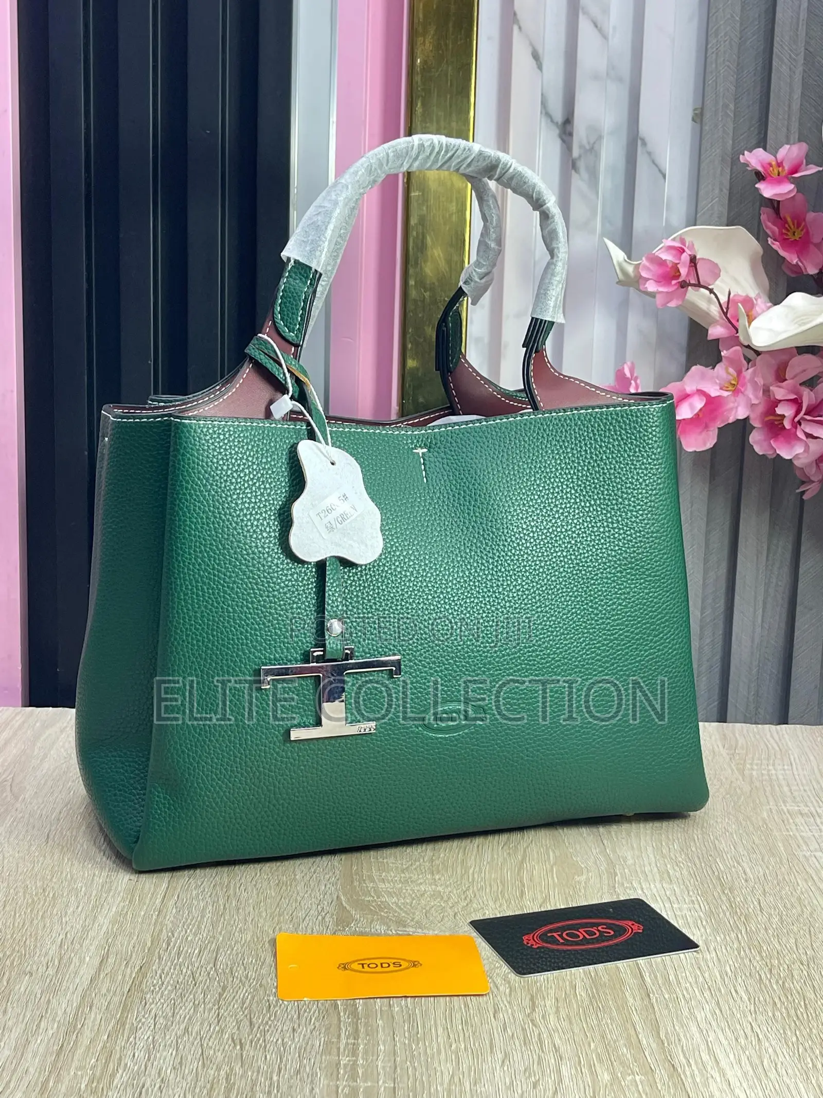 Tod Brand Bag Material:- Leather Gender:-Female Bag Size:- Midi