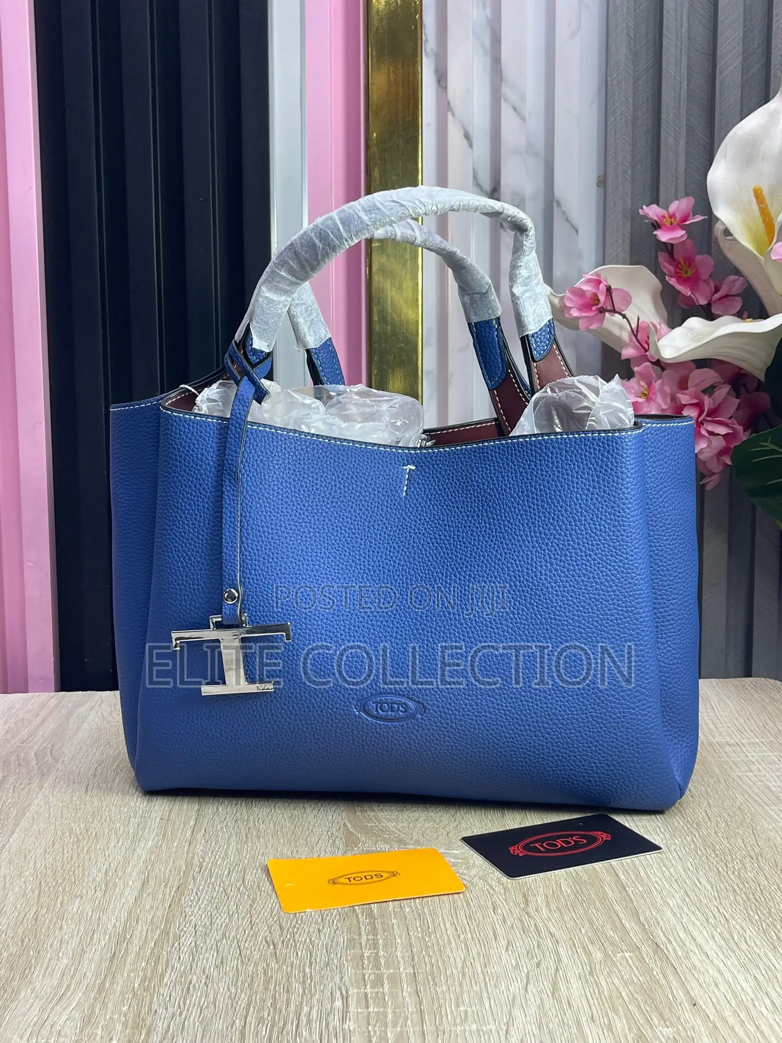 Tod Brand Bag Material:- Leather Gender:-Female Bag Size:- Midi
