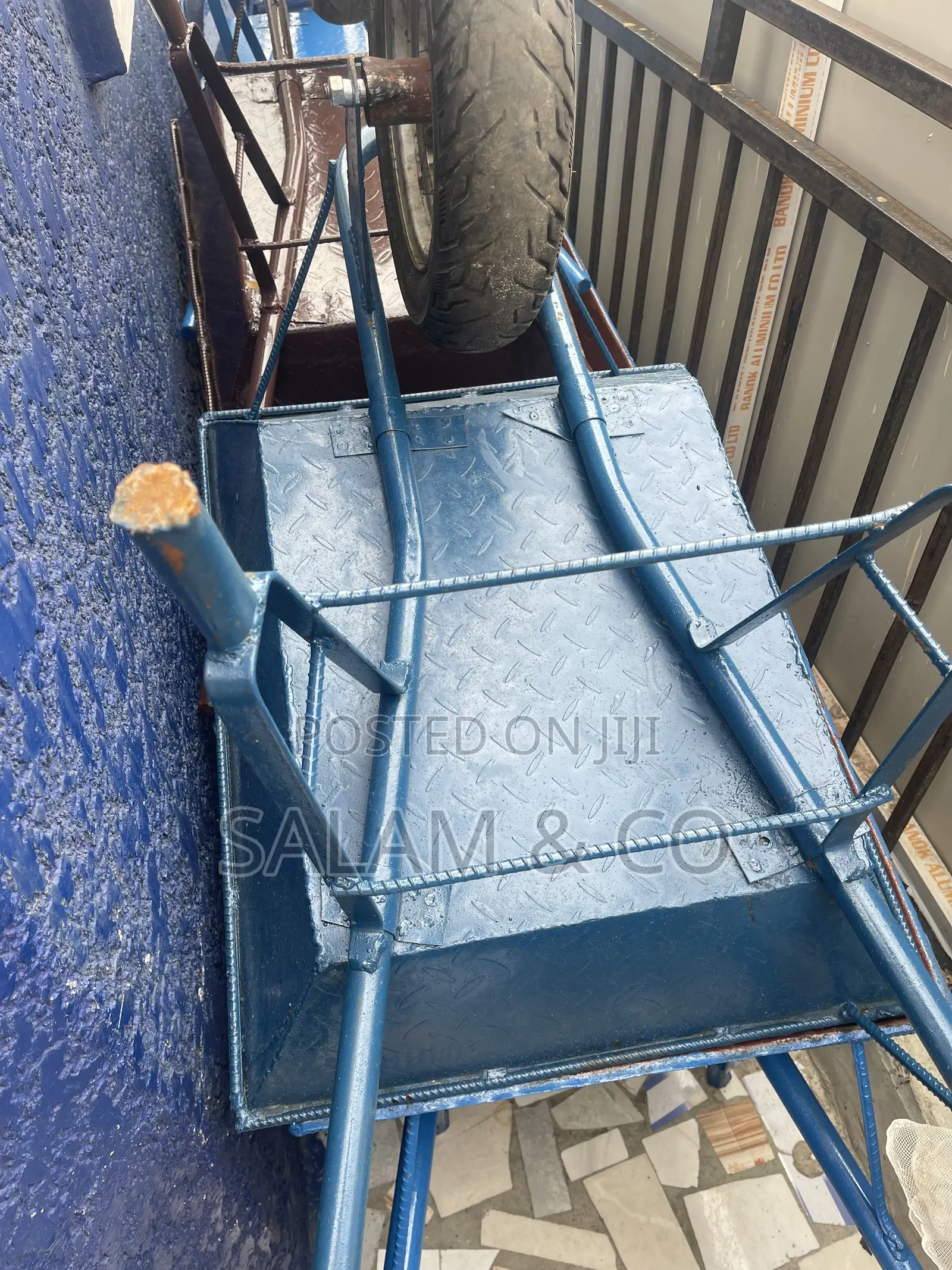 Heavy-duty Reinforced Steel Wheelbarrow – Durable Construction Barrow