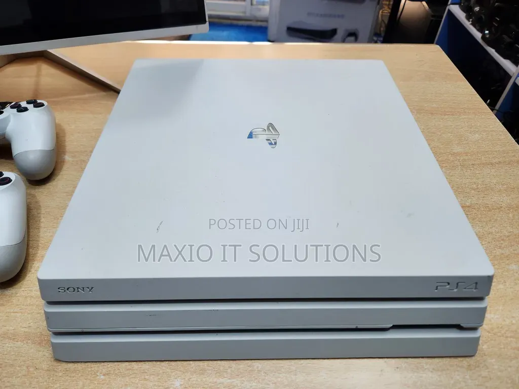 Clean Uk Used Hacked Ps4 Pro With Two Pads and Games