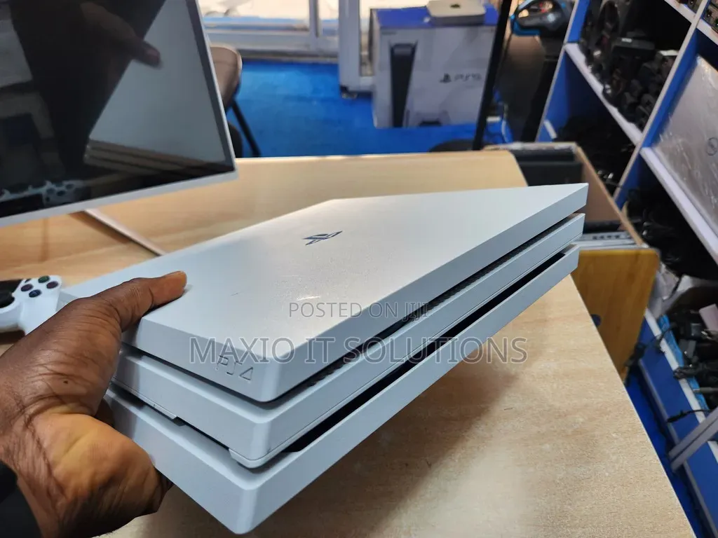 Clean Uk Used Hacked Ps4 Pro With Two Pads and Games