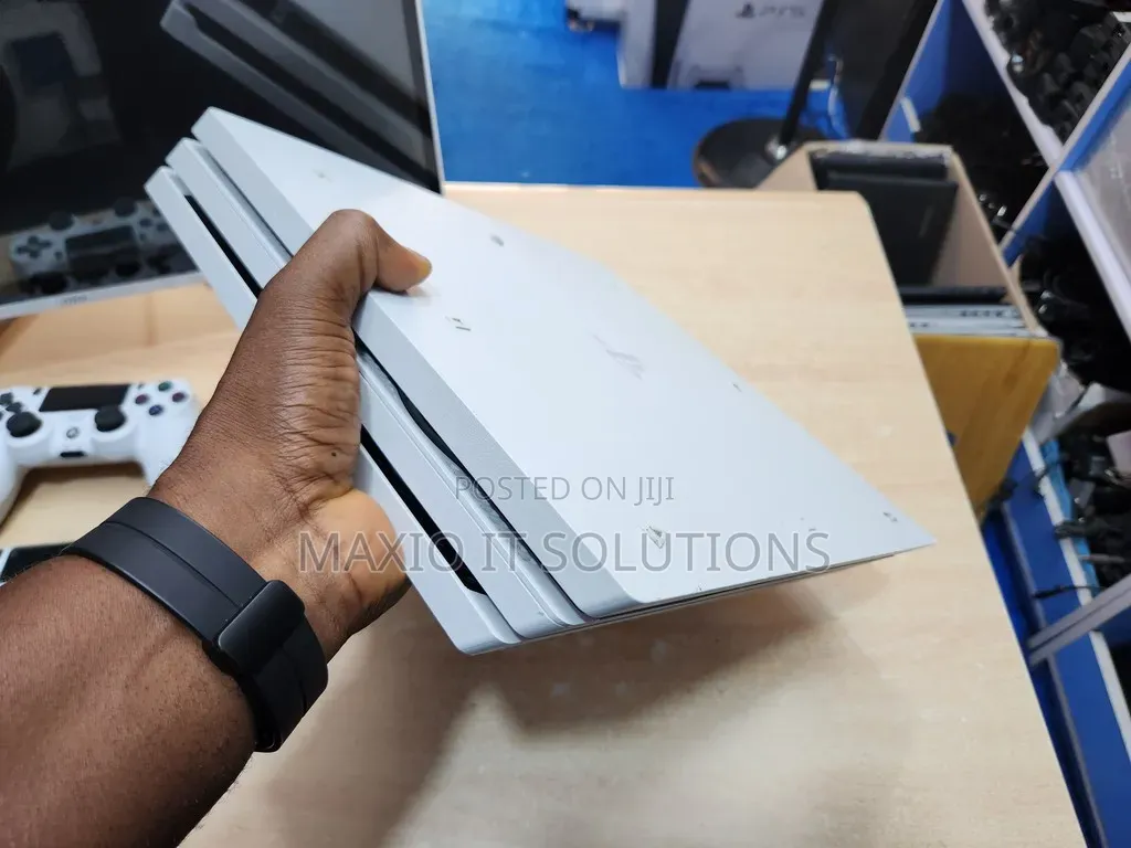 Clean Uk Used Hacked Ps4 Pro With Two Pads and Games