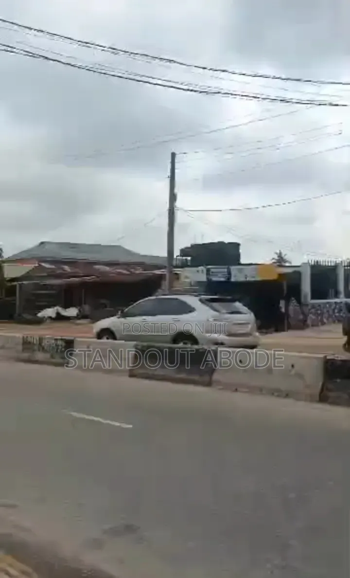 Half Plot of Land With Demolishable Building Facing Ekoro Road