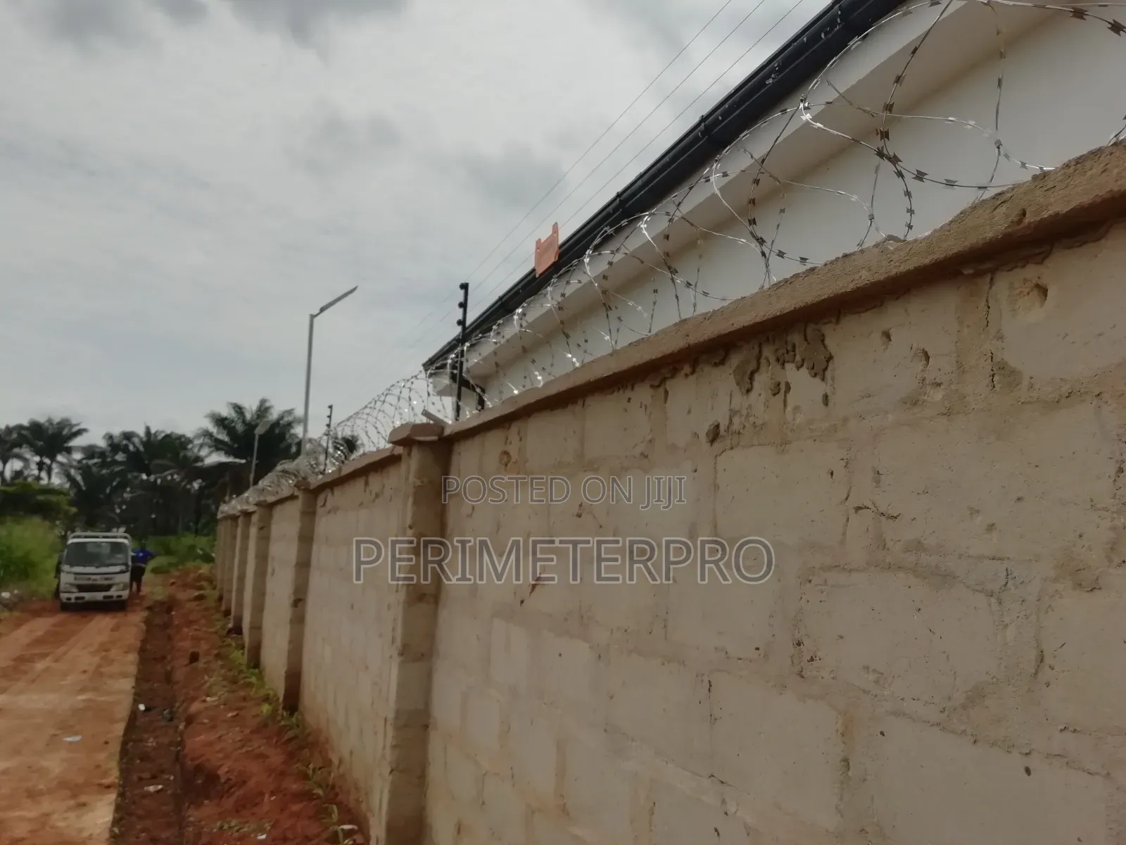 Perimeter Fence: Concertina Stainless Steel+Electric Fence