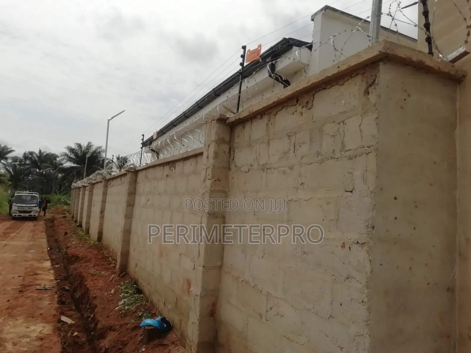 Perimeter Fence: Concertina Stainless Steel+Electric Fence
