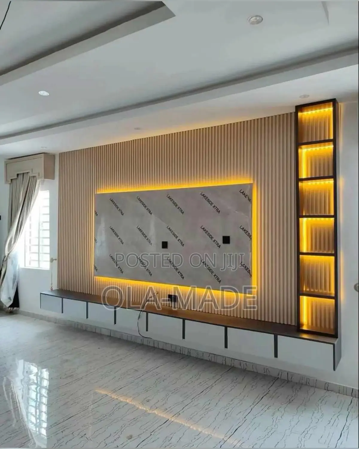 Luxury Tv Space With HDF Glossy Boards and Good Lighting