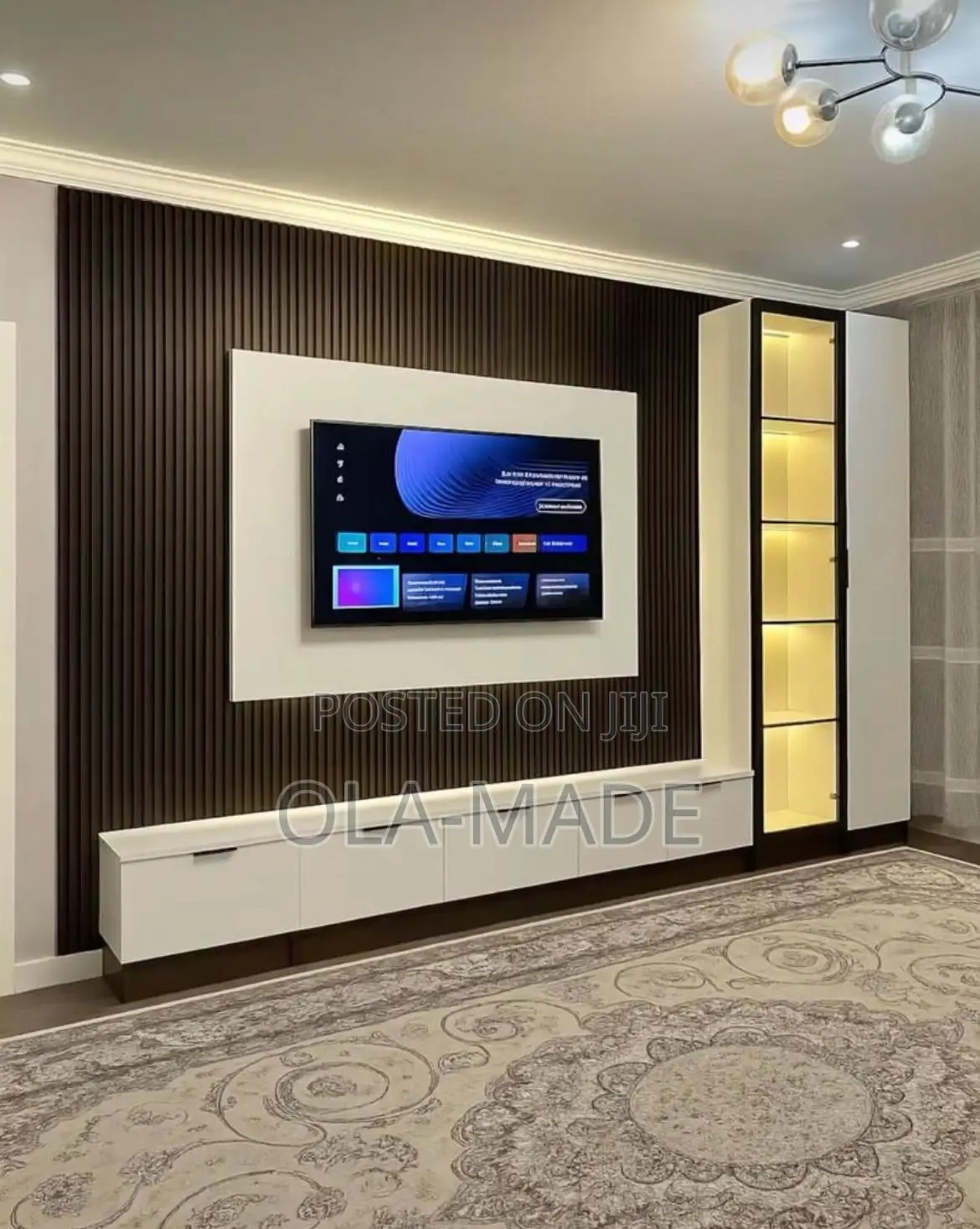 Luxury Tv Space With HDF Glossy Boards and Good Lighting