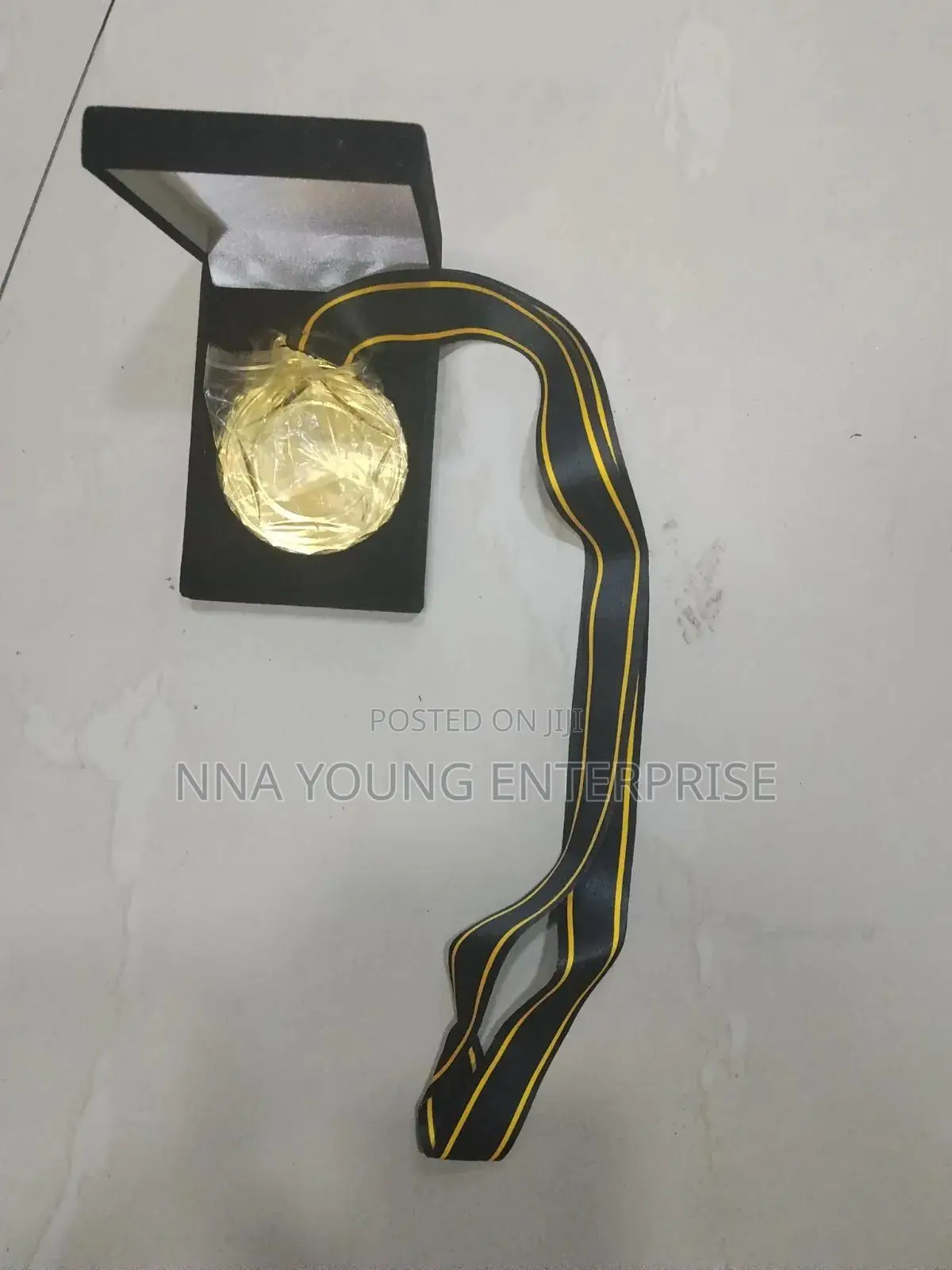 Gold-colored Metal Medal