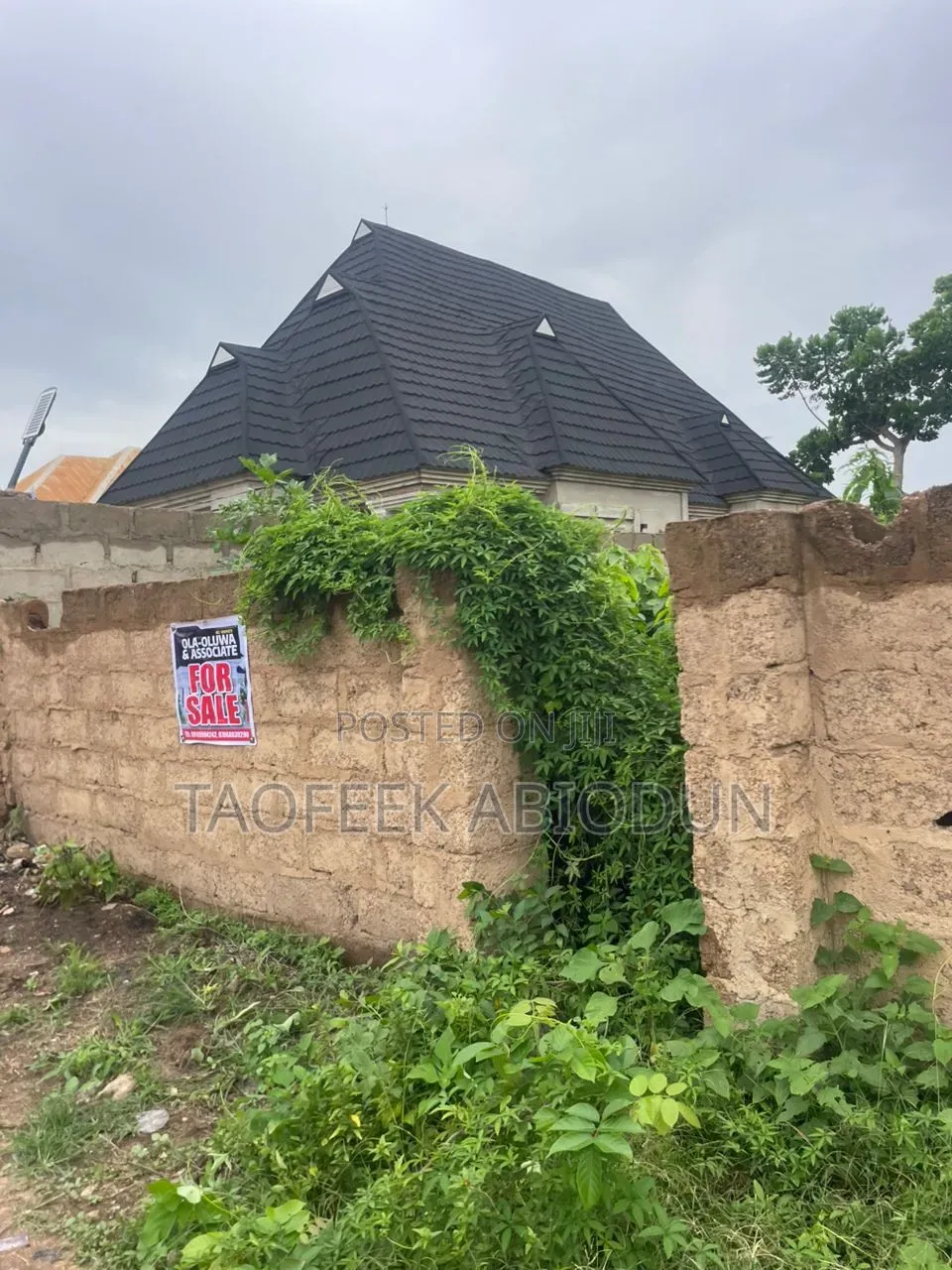 A Plot of Land at Adeleke Estate With Fence and Gate