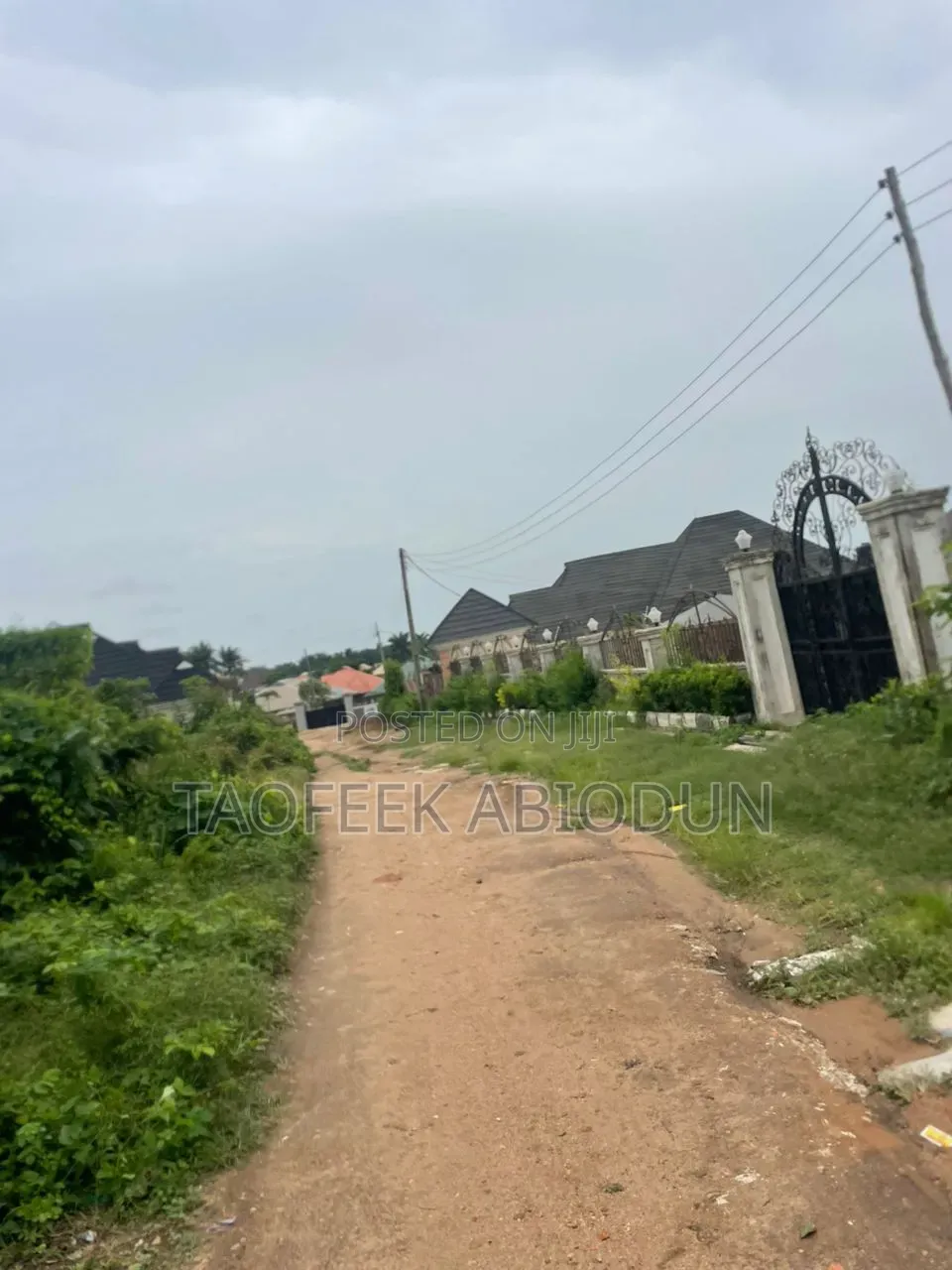 A Plot of Land at Adeleke Estate With Fence and Gate