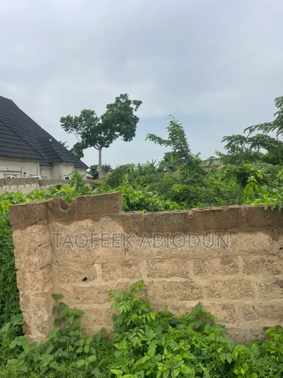 A Plot of Land at Adeleke Estate With Fence and Gate