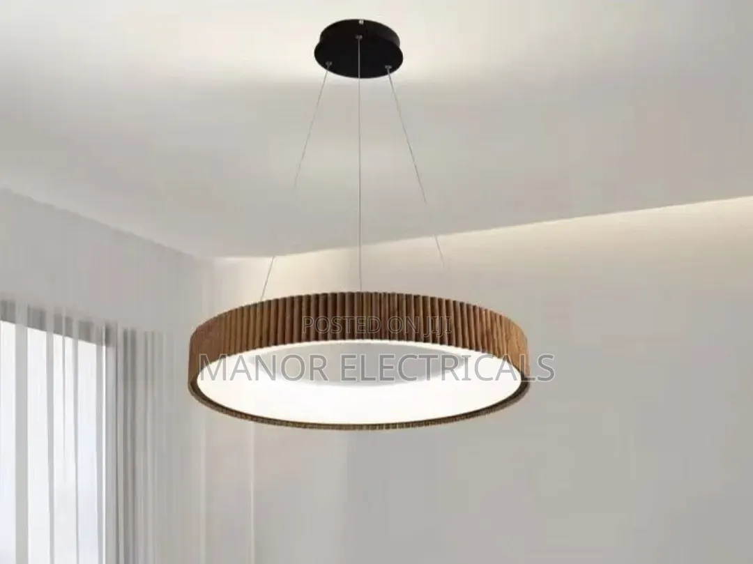 Elegant Modern Brown Body Chandelier Available at Manor Electrical
