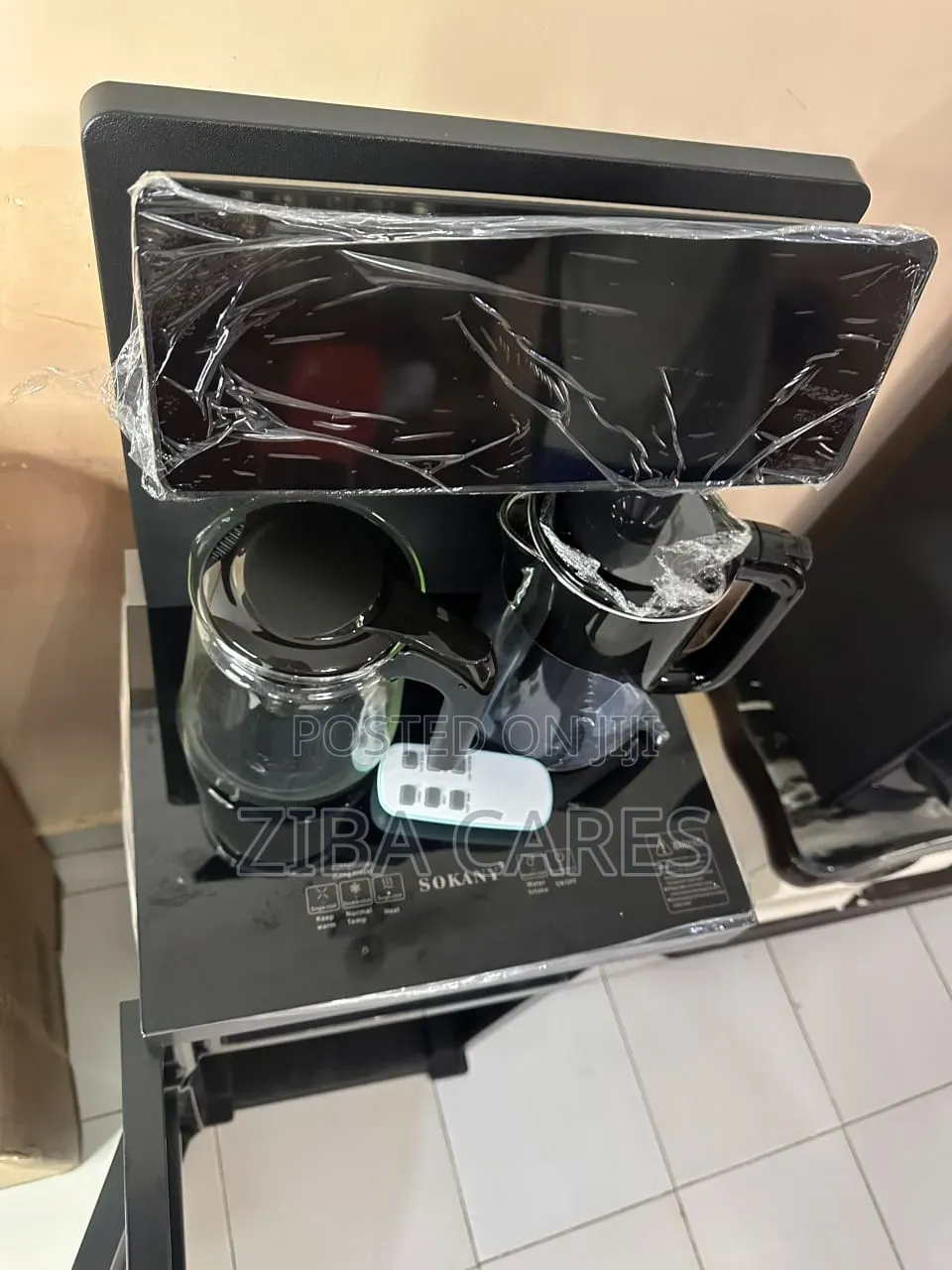 Hot and Cold Water Dispense With a Tea Bar ( Has a Compressor)