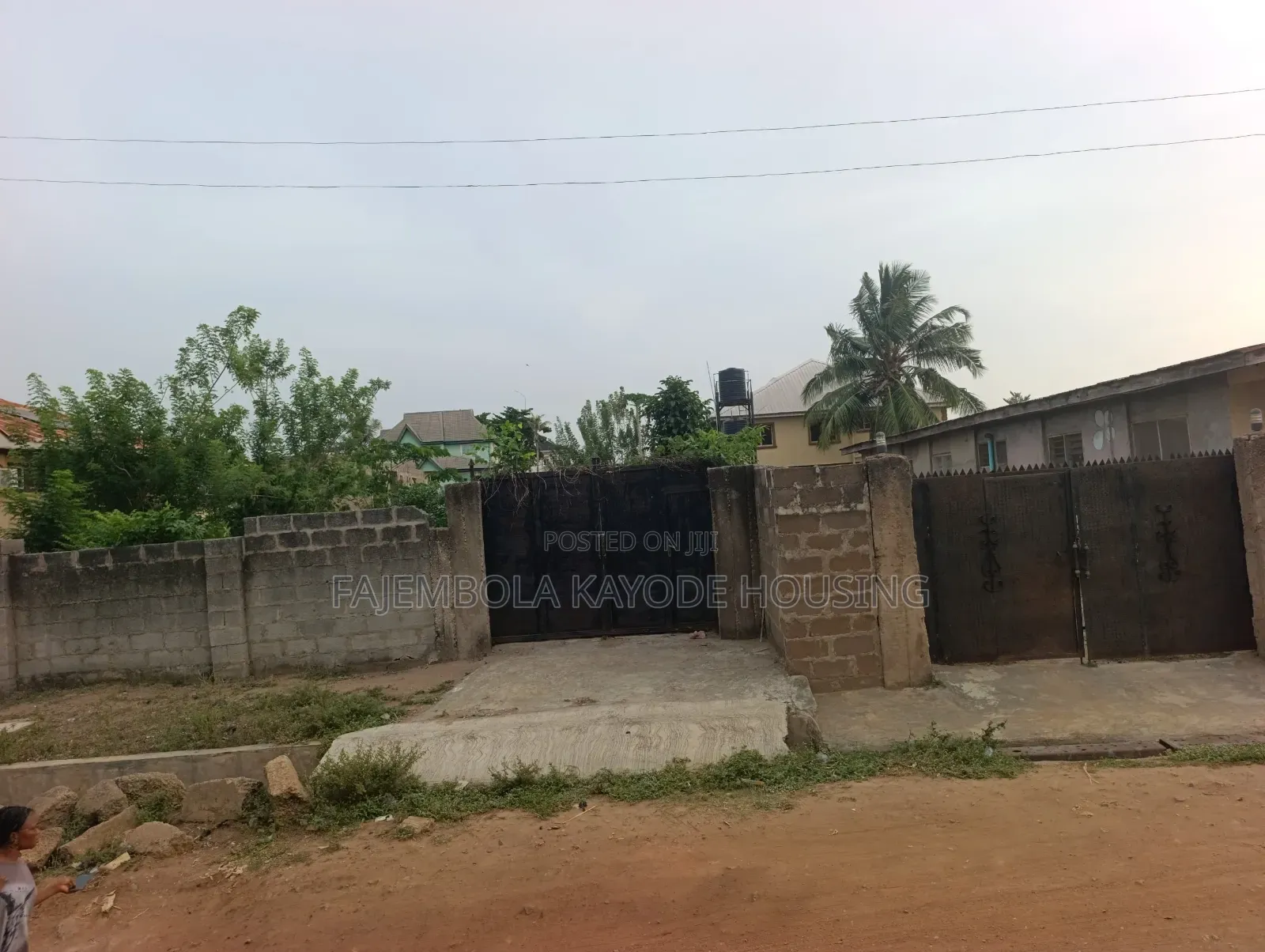 A Well Fenced and Gated Two Plots of Land