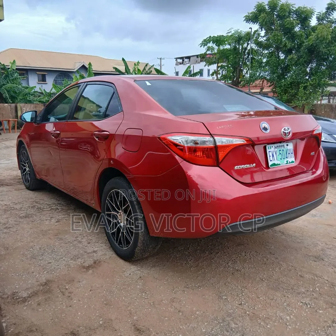 Toyota Corolla L 4dr Sedan (1.8L 4cyl 6M) 2014 Red