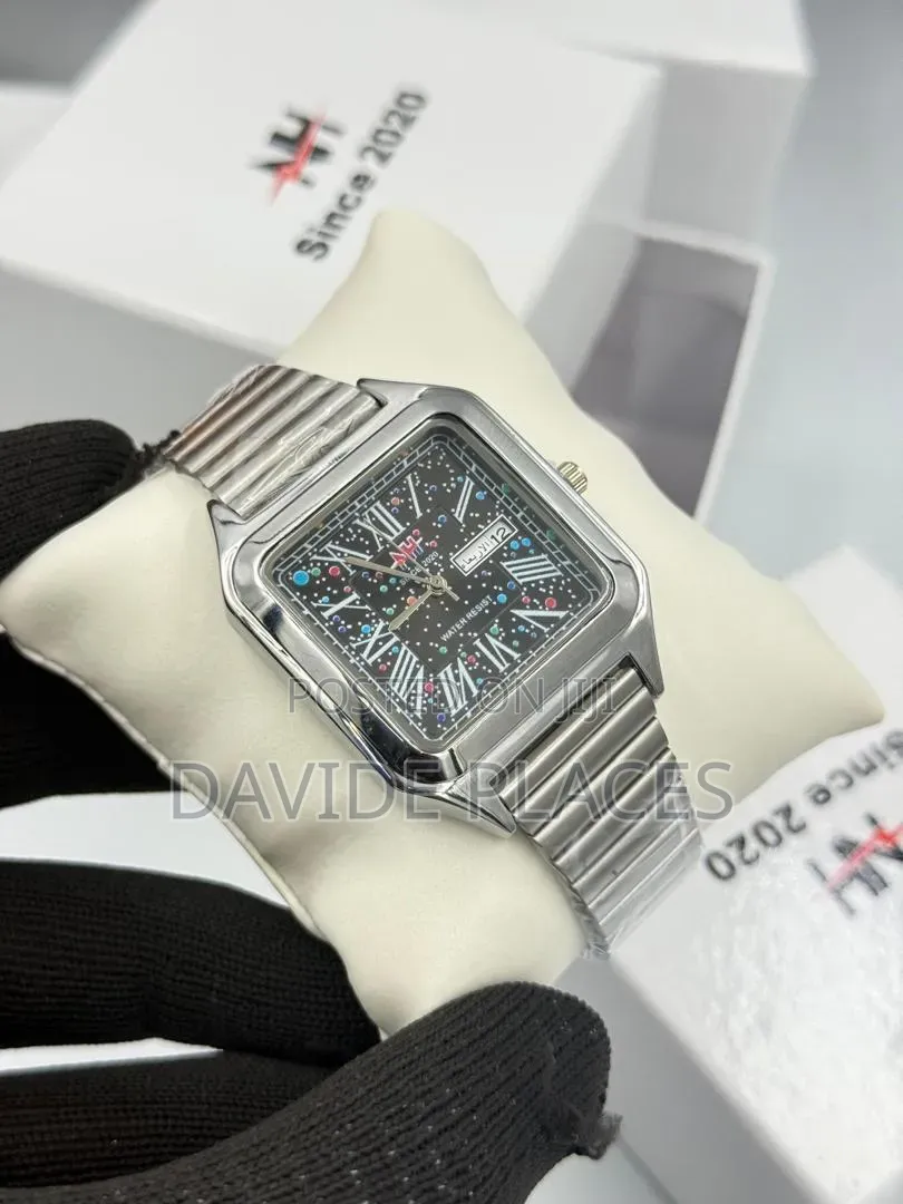 Nh Stainless Steel Chain Watch. • the Dial Showcases a Cosmic-Inspir