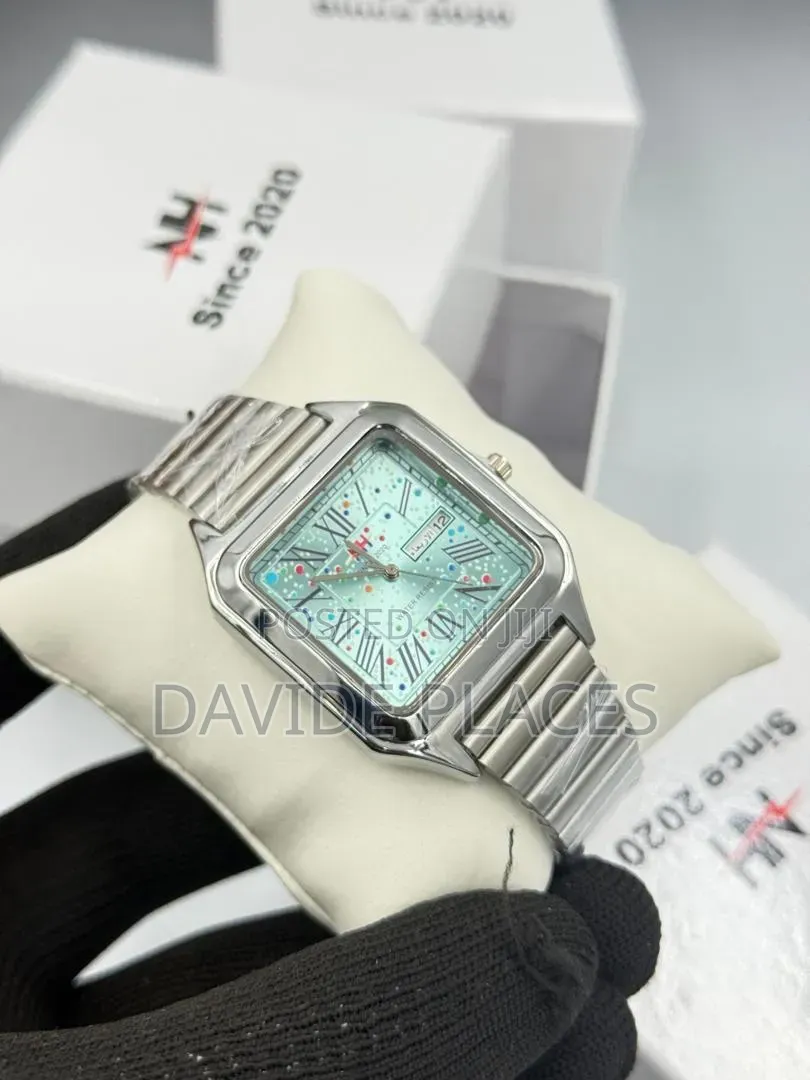 Nh Stainless Steel Chain Watch. • the Dial Showcases a Cosmic-Inspir
