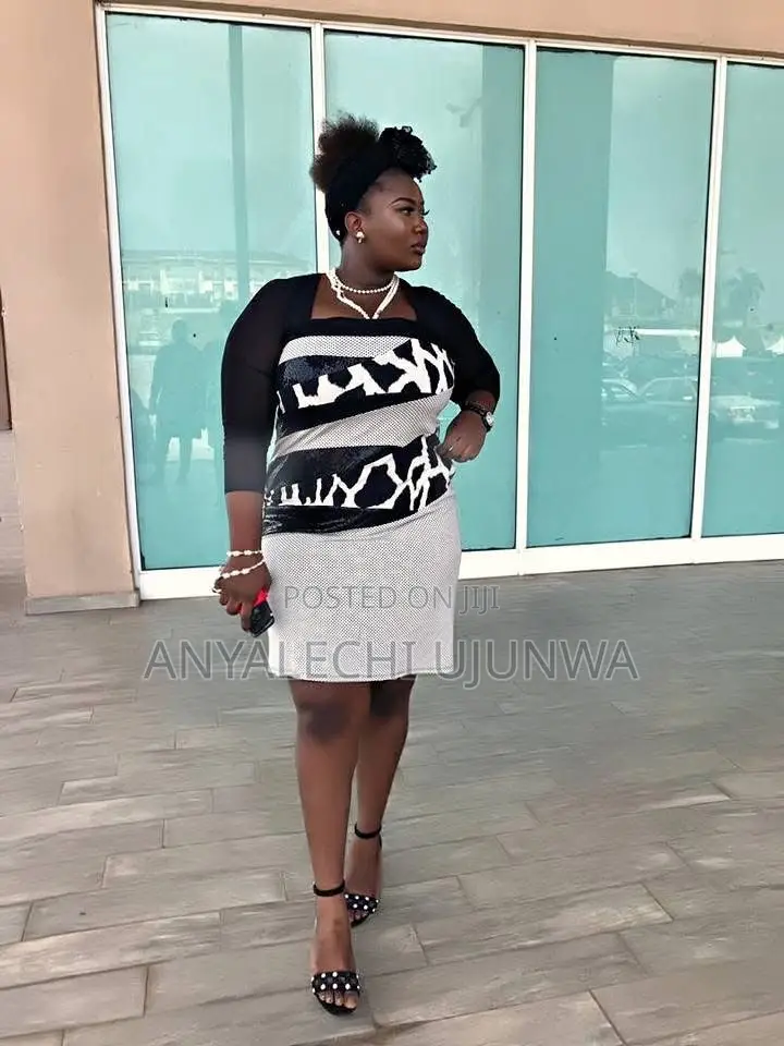 “Executive Queen Midi Dress”