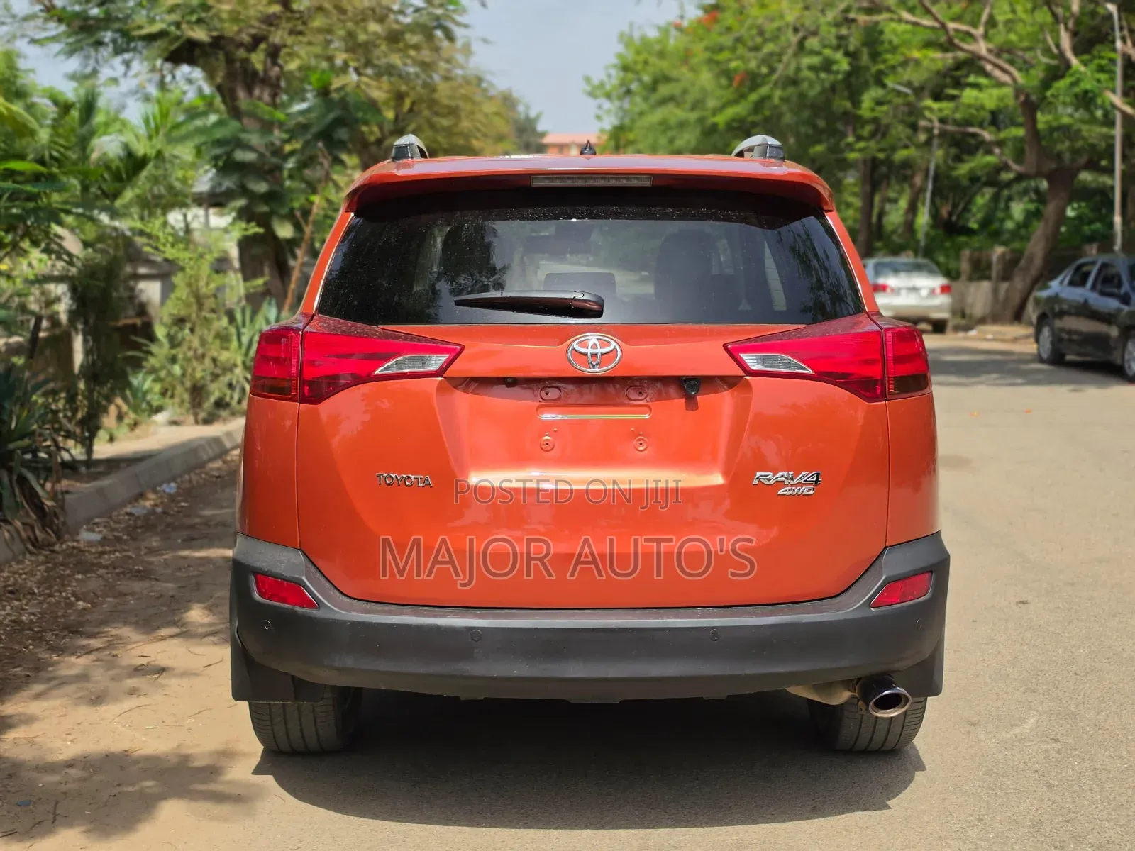 Toyota RAV4 XLE AWD (2.5L 4cyl 6A) 2016 Orange