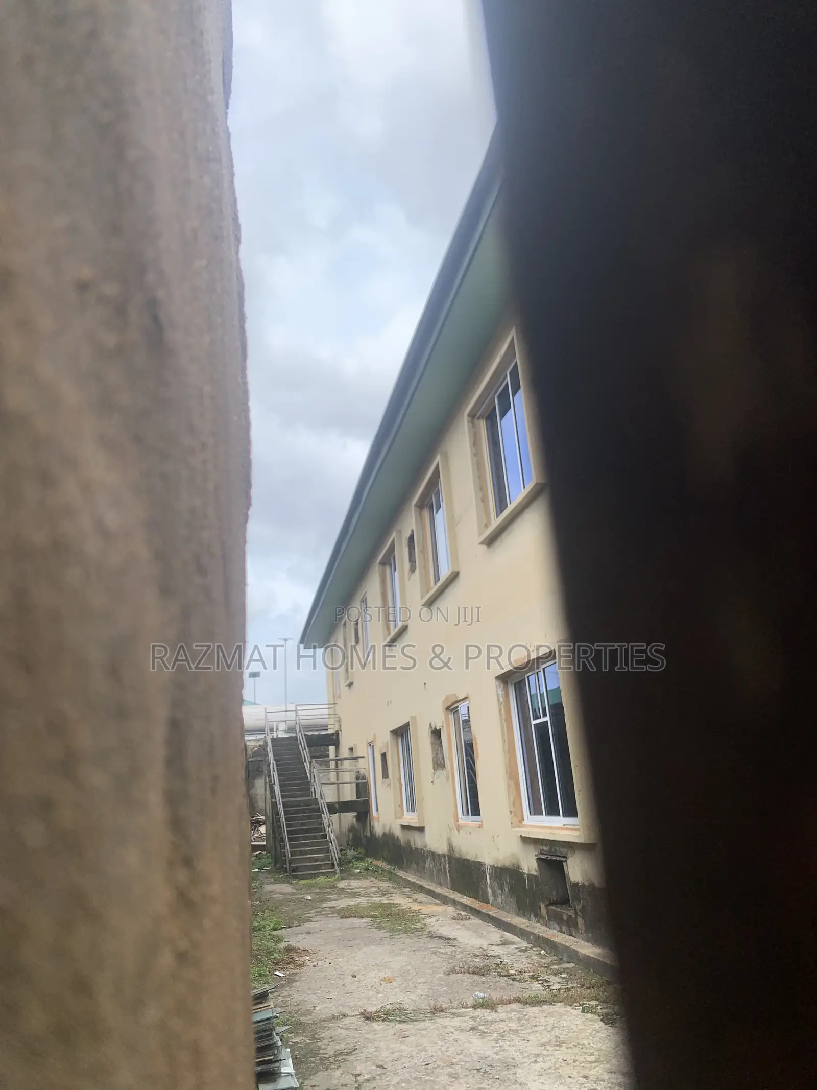 A Story Building on a Corner Piece of Land for Lease 80% Open Floor