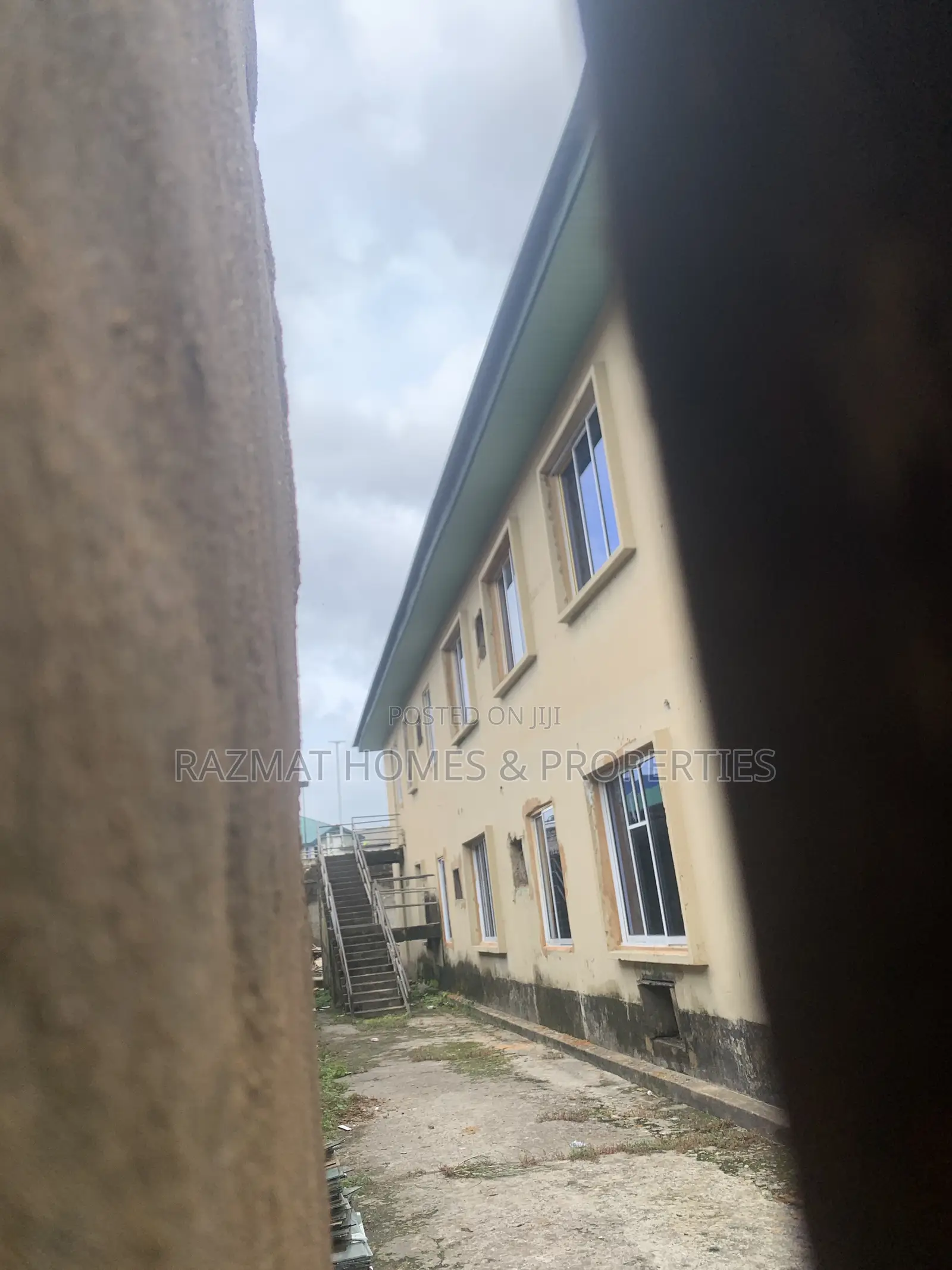 A Story Building on a Corner Piece of Land for Lease 80% Open Floor