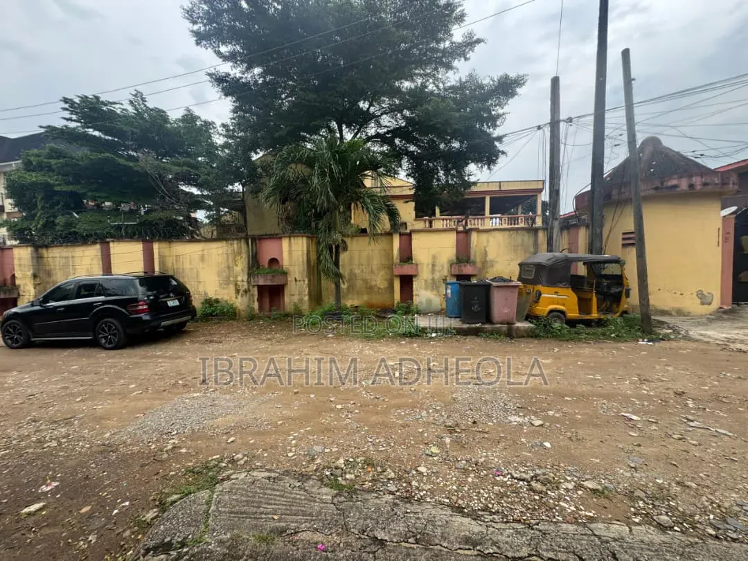 Land Measuring 1998sqm With a Demolishable Structure
