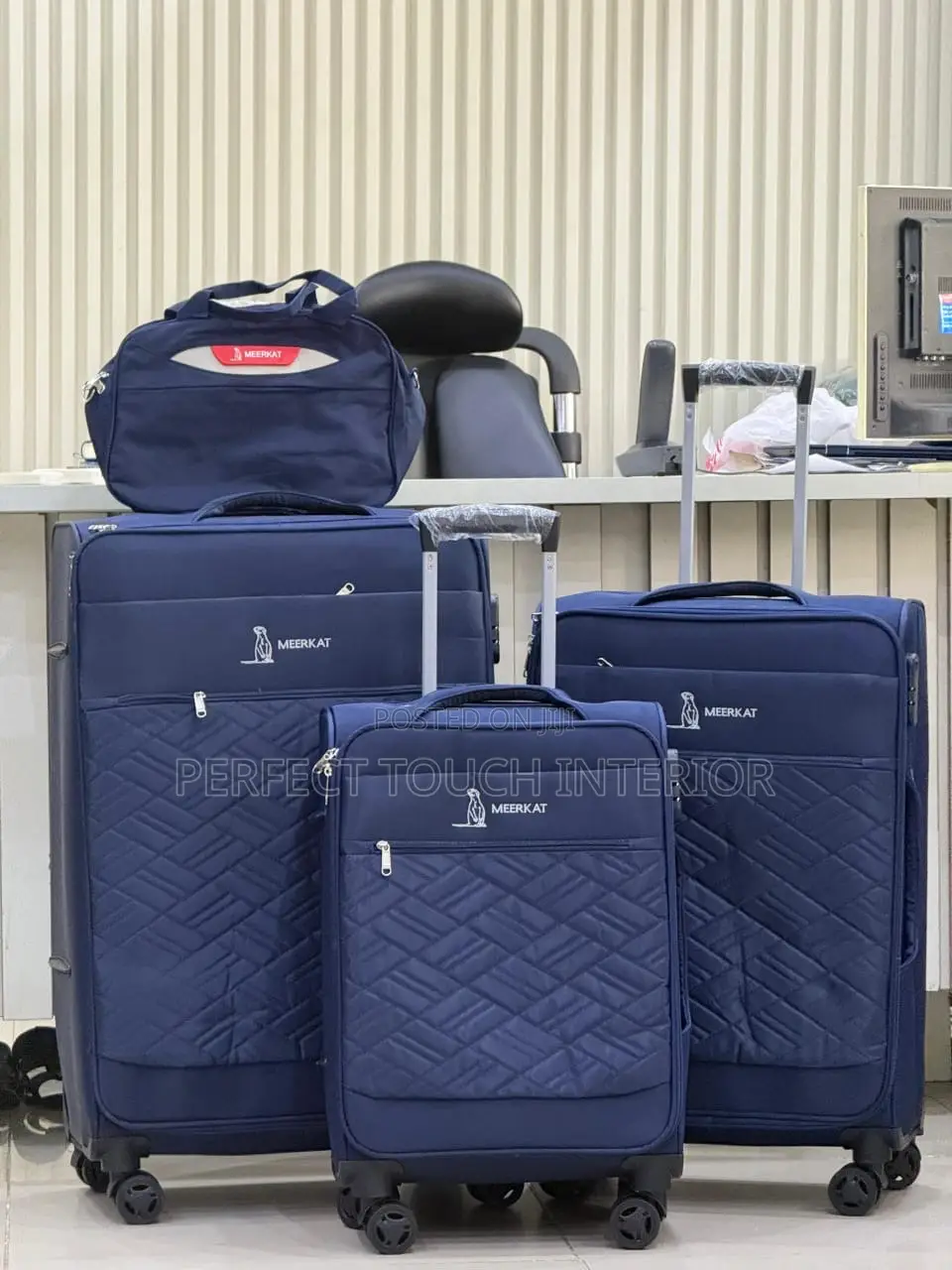 A 4-Piece Luggage/Travel Suitcase Set Consisting Of: