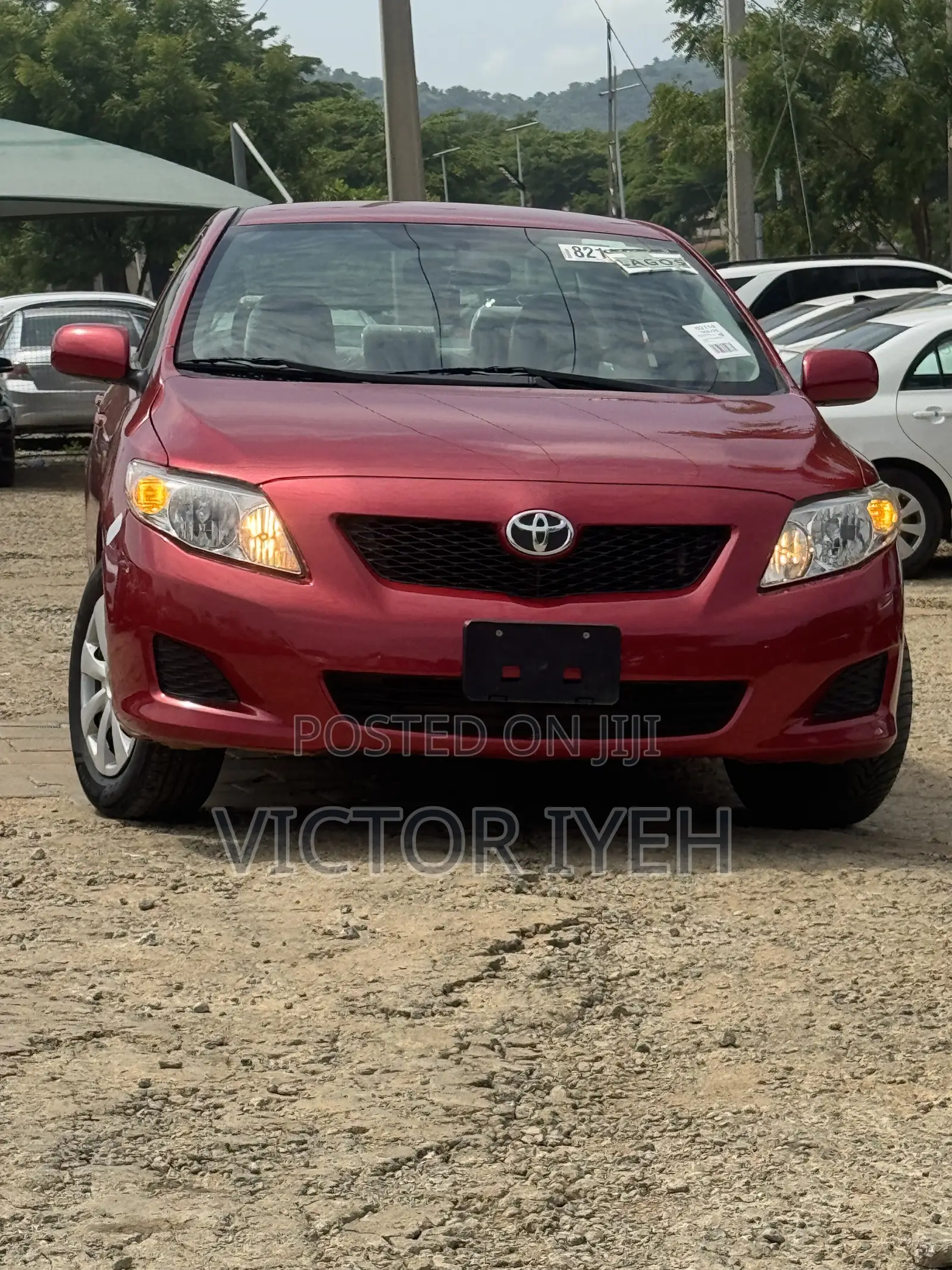 Toyota Corolla Base 4dr Sedan (1.8L 4cyl 5M) 2010 Red