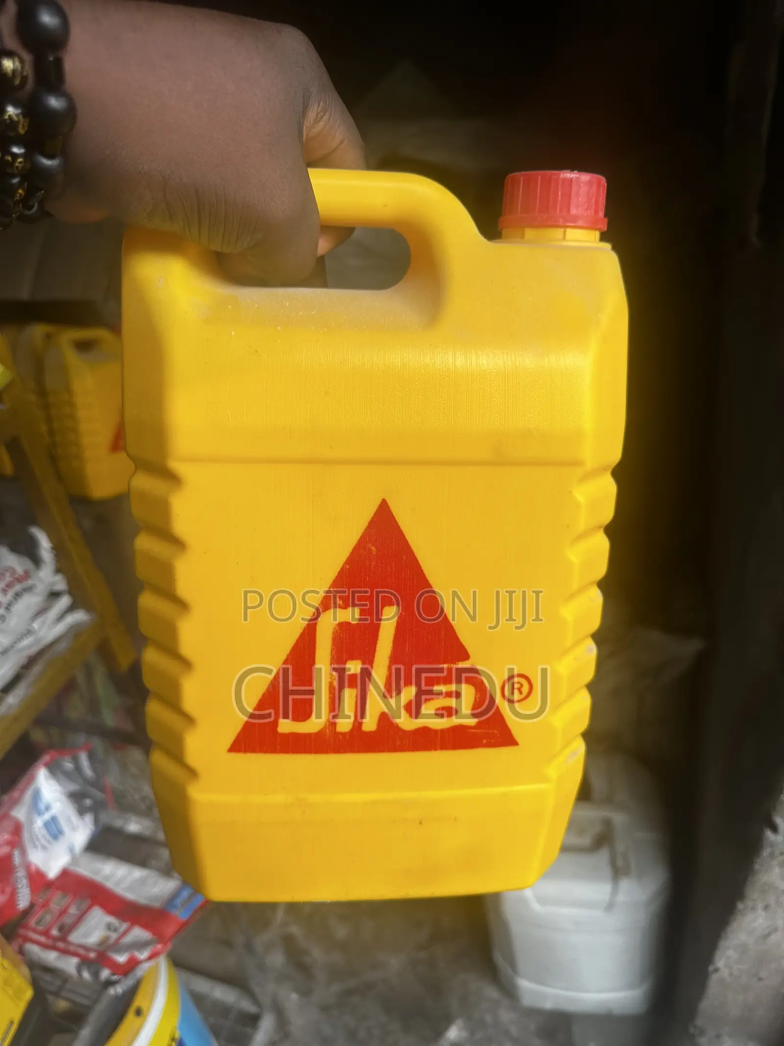 Sikalatex Acrylic Bonding Agent and Waterproofing Additive.