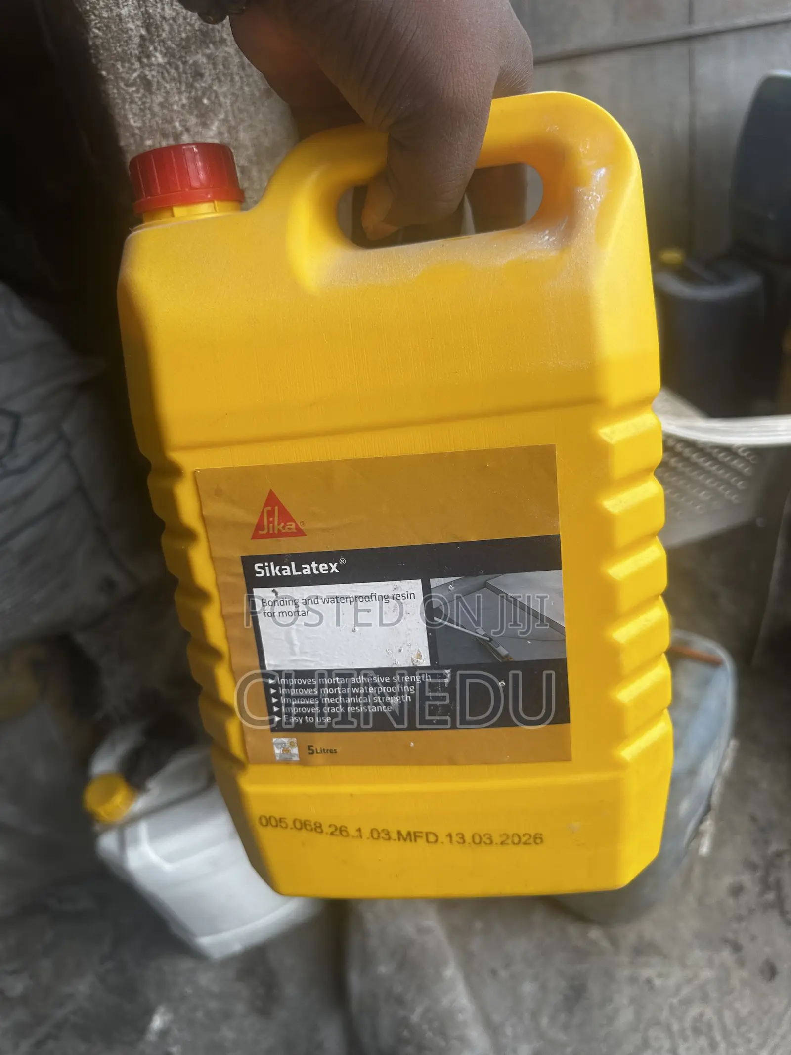 Sikalatex Acrylic Bonding Agent and Waterproofing Additive.