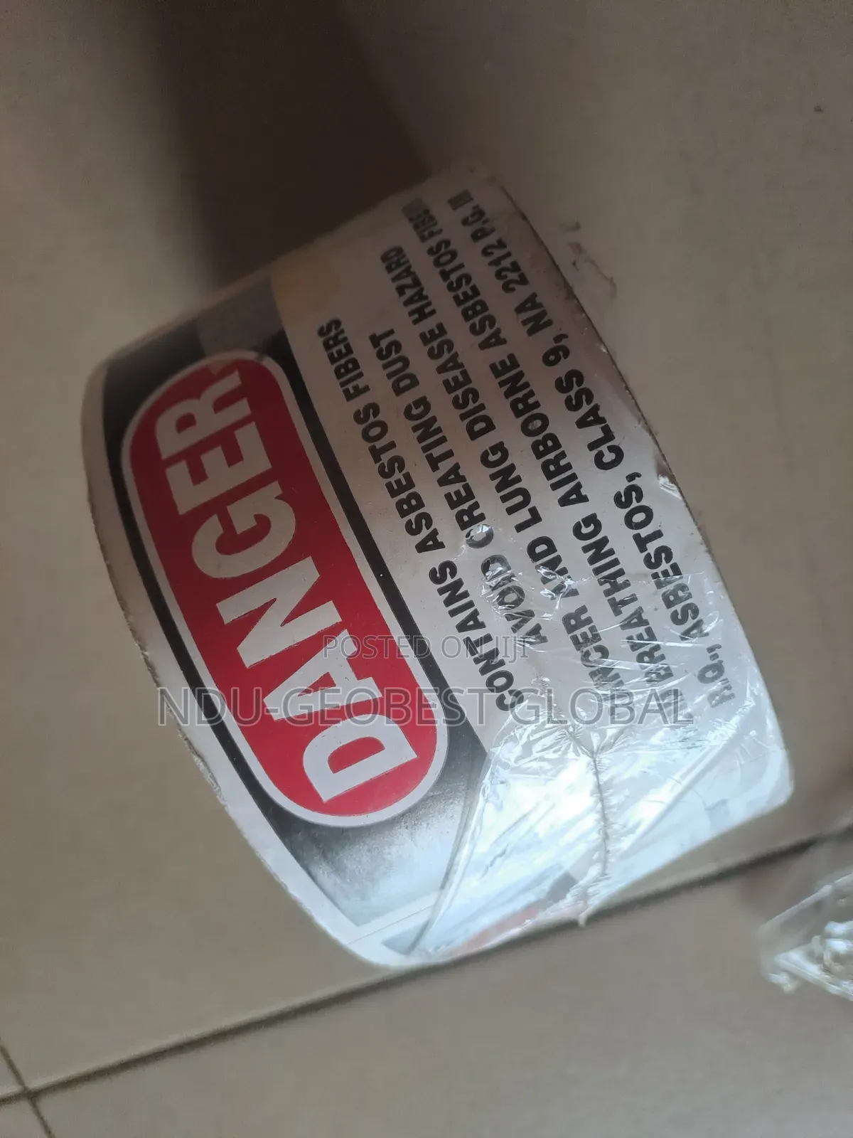 Danger Contains Asbestos Fibers