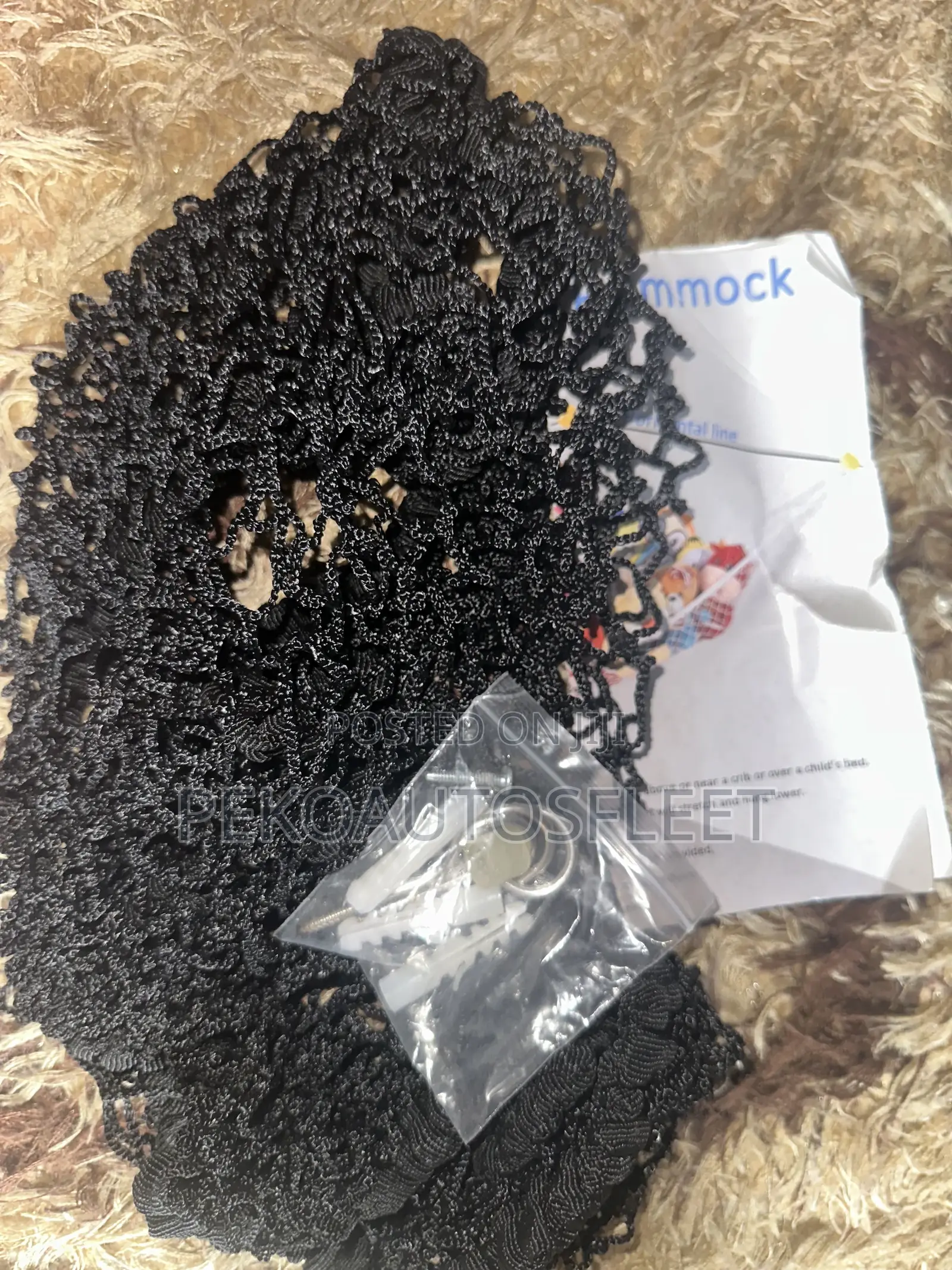 Black Mesh Hammock Designed to Store Plush Toys.
