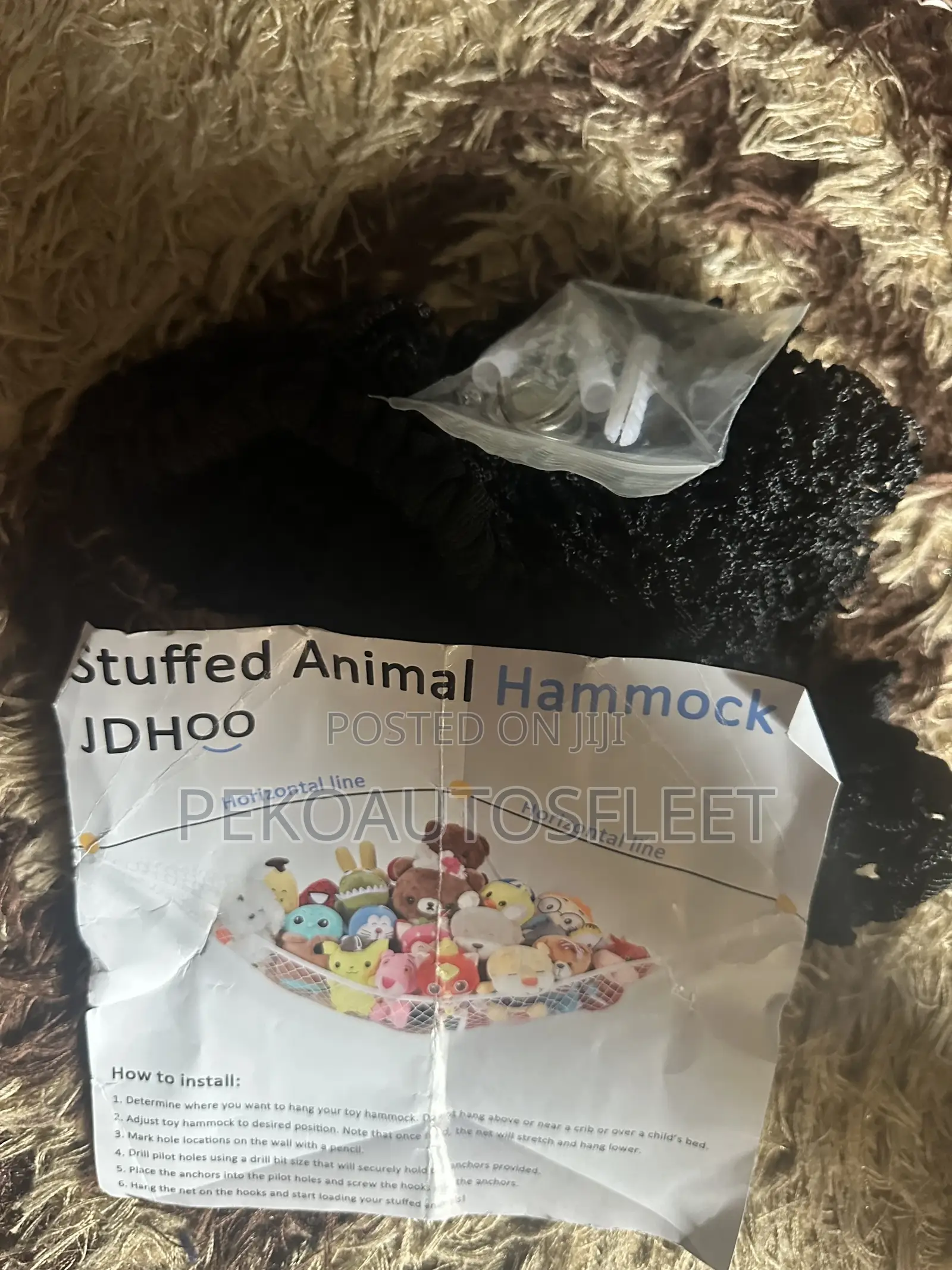 Black Mesh Hammock Designed to Store Plush Toys.